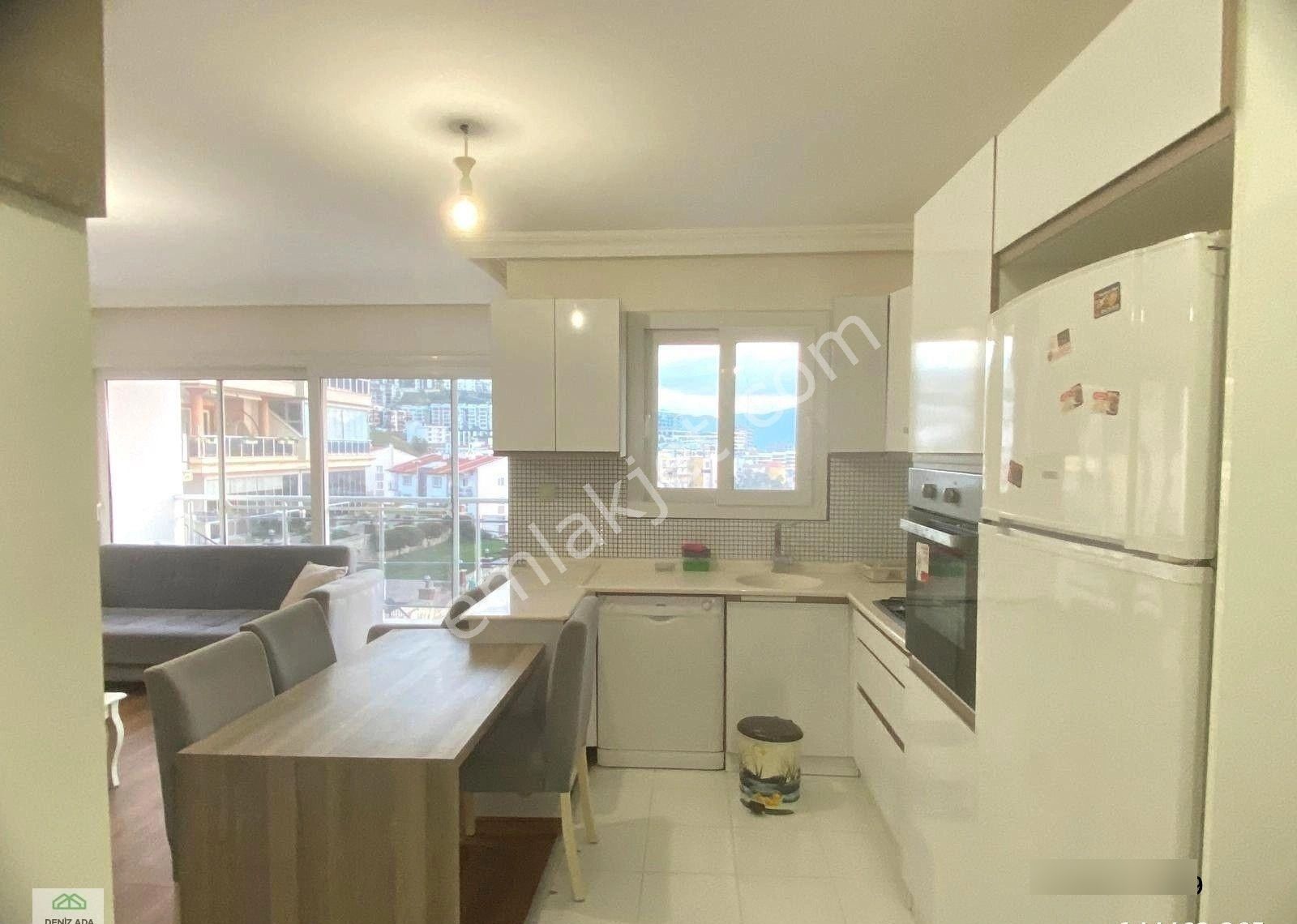 Kuşadası’nın Kalbinde Kadınlar Denizi Mahallesi’nde, Tam Panoramik Deniz Manzaralı 1+1 Satılık Daire - Görsel 14