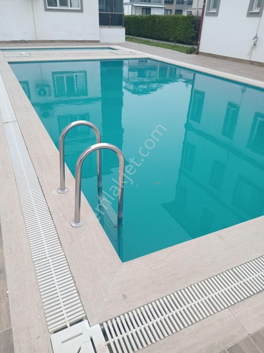 Göcekli Emlak Tan Dalaman Hürriyette Havuzlu 2+1 Satılık Daire