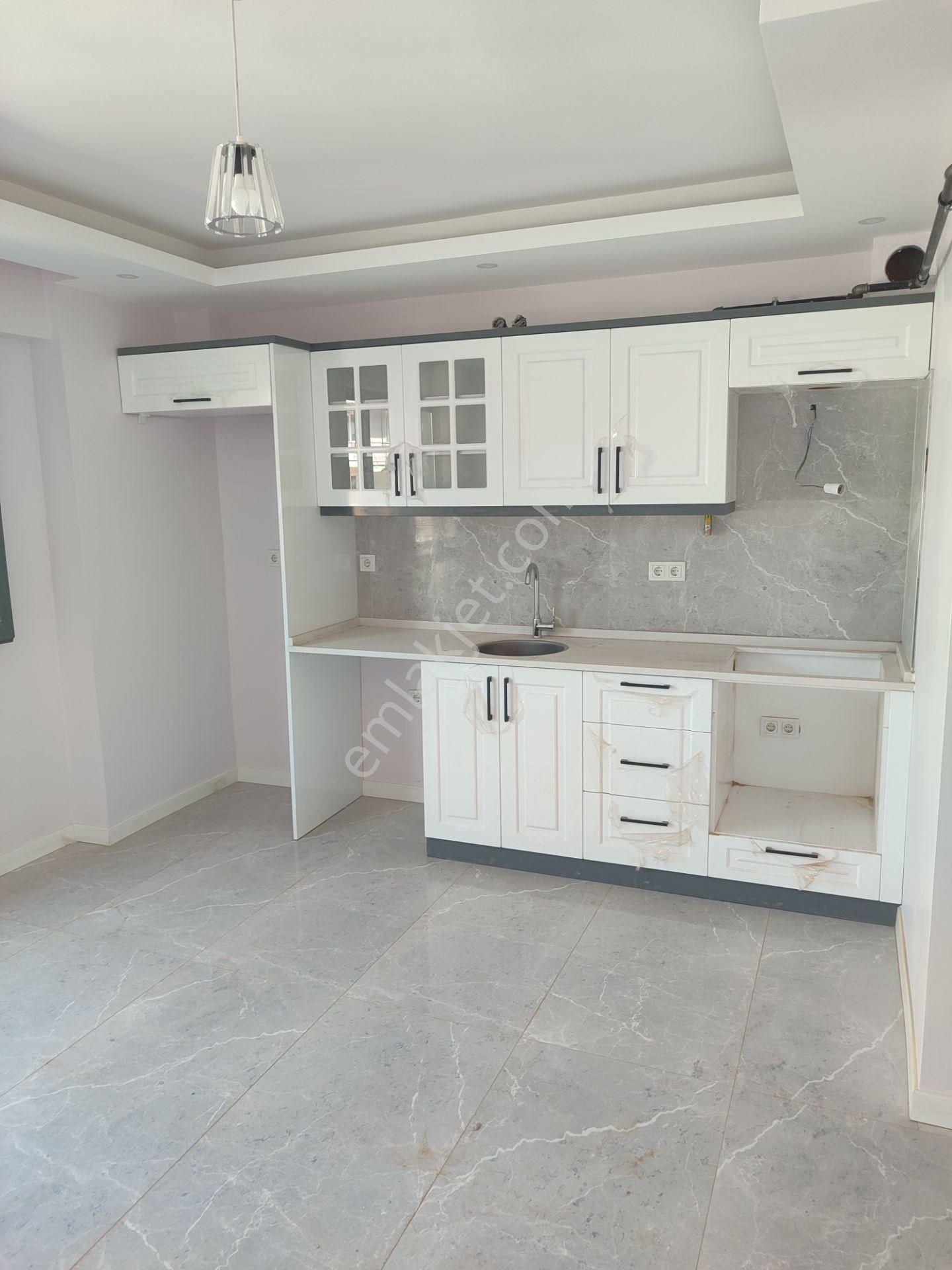 Kemalpaşanın Merkezinde Satılık Daire 1+1 Yeni Sıfır Asansörlü