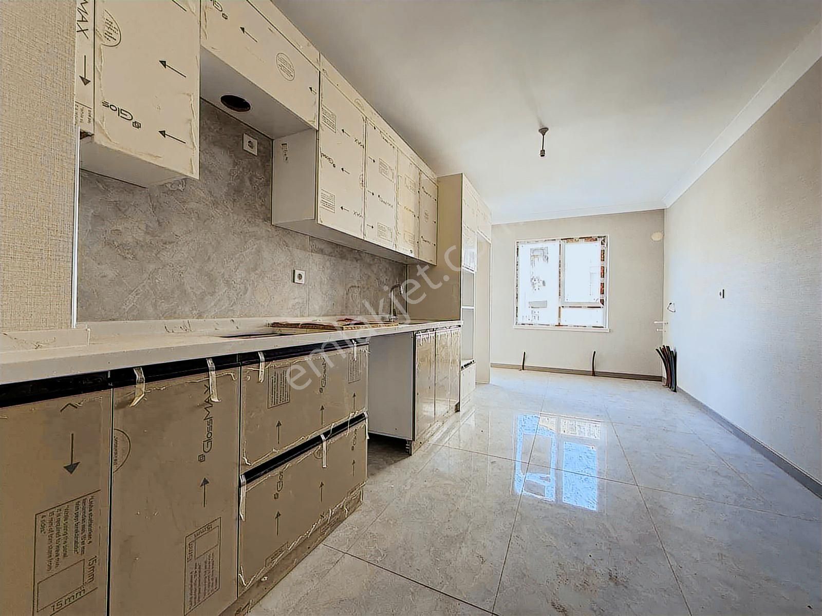 Şentürk Gayrimenkul'den*çift Banyolu**süper Konumda**sıfır Daire