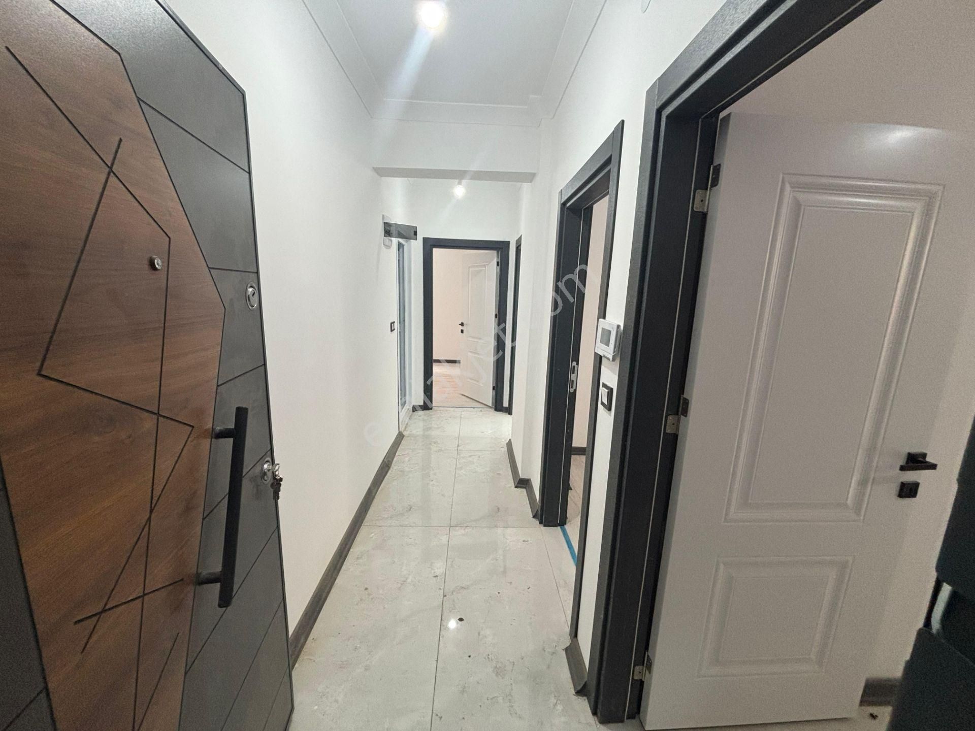 Güven'den Çarşı İçin'de K. Otoparklı Ara Kat İskanlı 2+1 Daire - Görsel 25