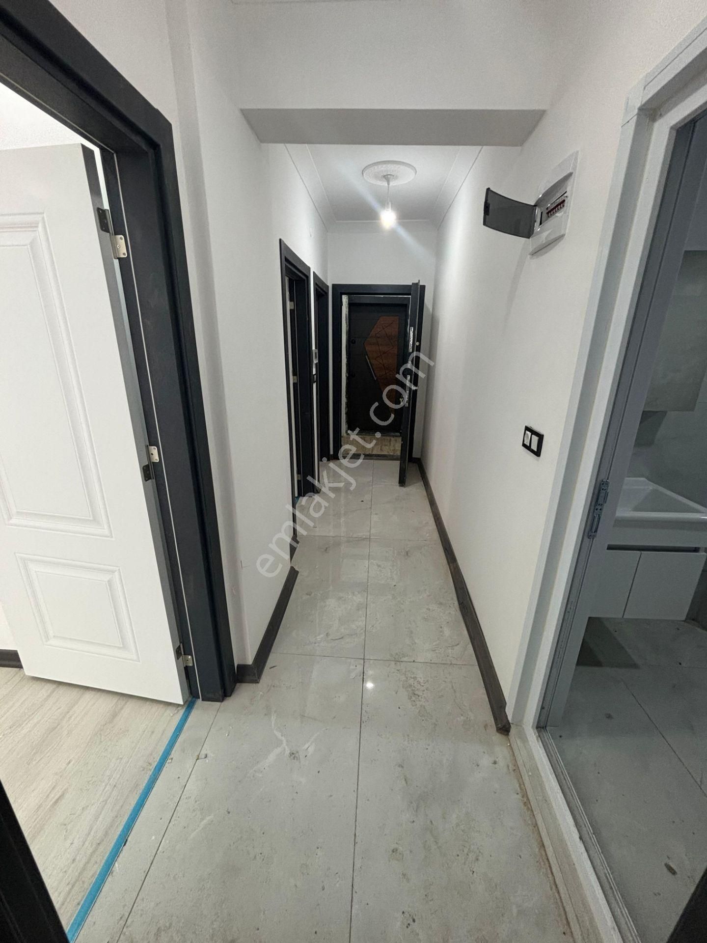 Güven'den Çarşı İçin'de K. Otoparklı Ara Kat İskanlı 2+1 Daire - Görsel 24