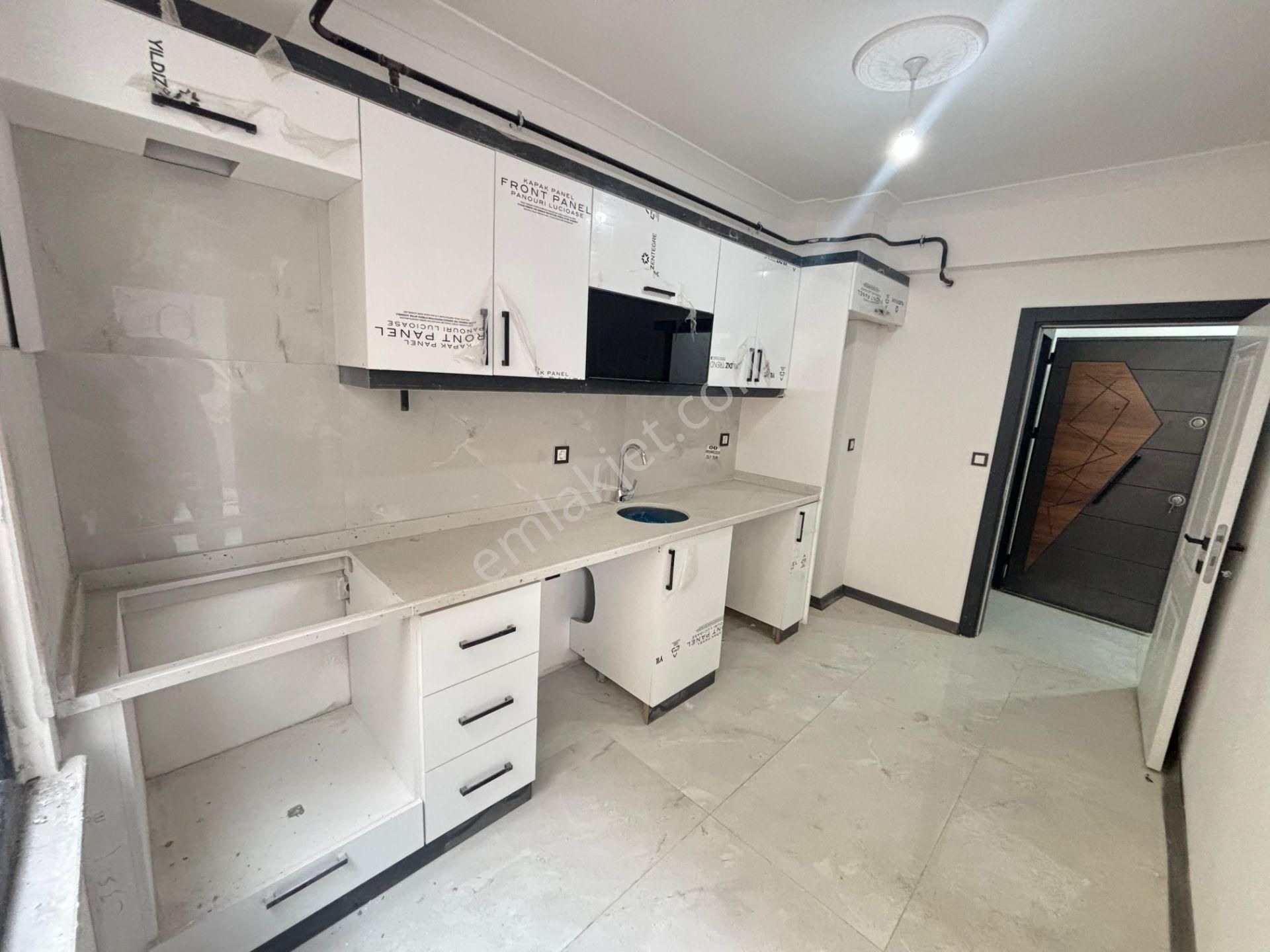 Güven'den Çarşı İçin'de K. Otoparklı Ara Kat İskanlı 2+1 Daire - Görsel 10