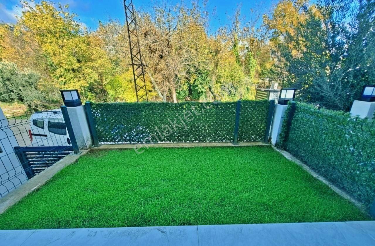 Uytundan Güre'de Doğayla İç İçe Bahçeli Satılık 3+1 Villa