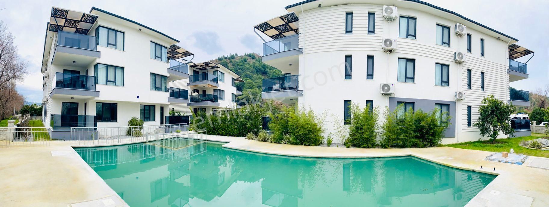 Dalaman Da Limon Bahçeleri İçerisinde Satılık Lüx Havuz Manzaralı 2+1 Daire