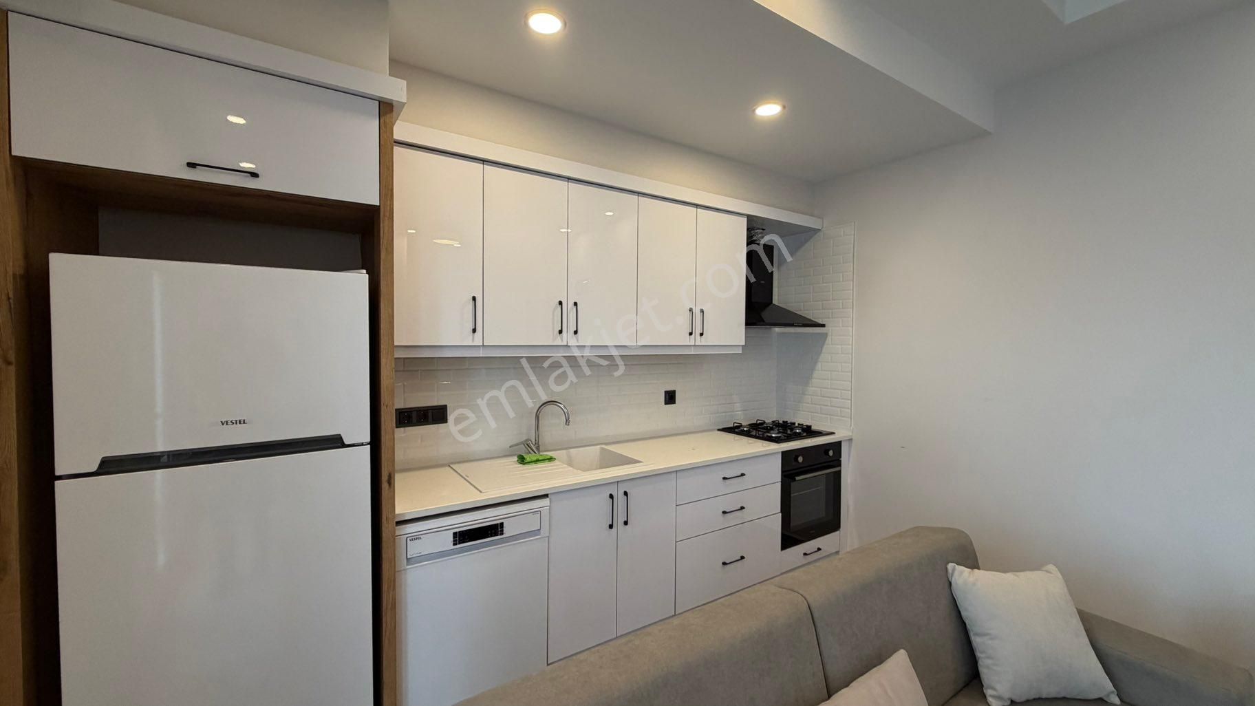 Kuşadası Güzelçamlıda Sıfır Yapım Satılık Eşyalı 1+1 Daire - Görsel 27