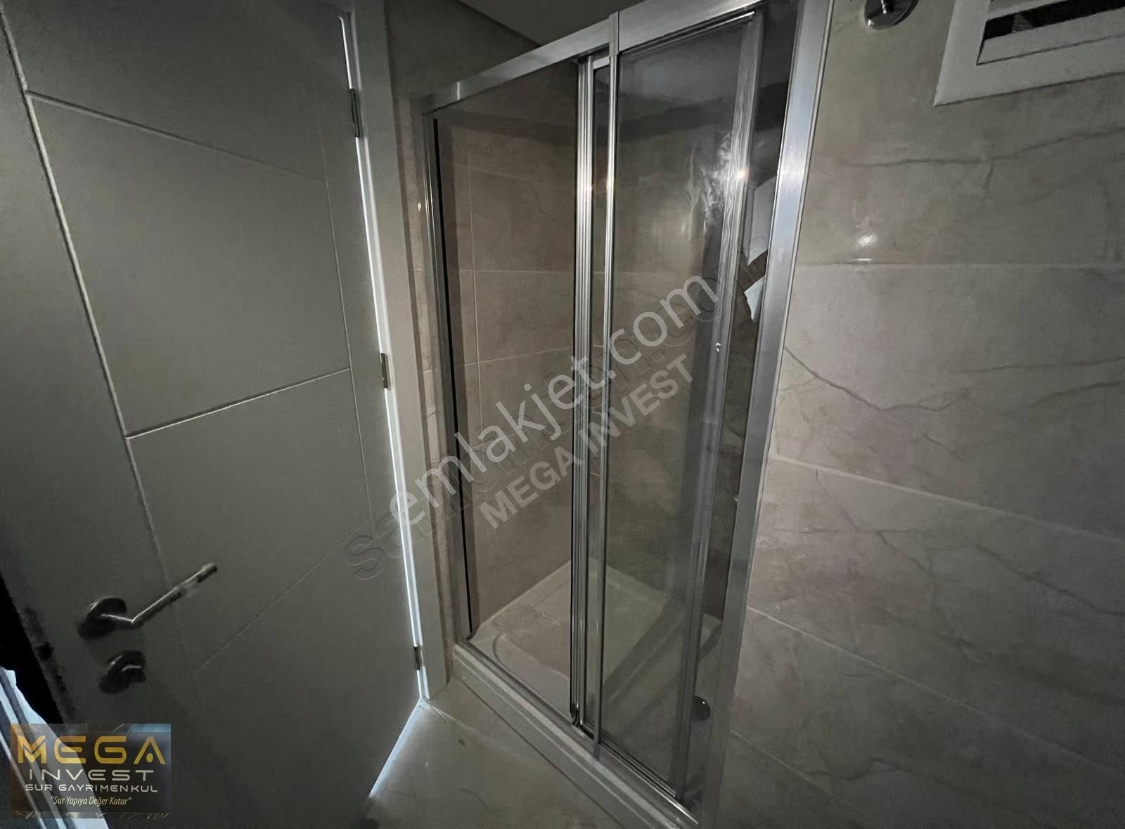 Mega İnvest'den Sur Yapı'da Deniz Manzaralı Satılık 2+1 Daire - Görsel 19