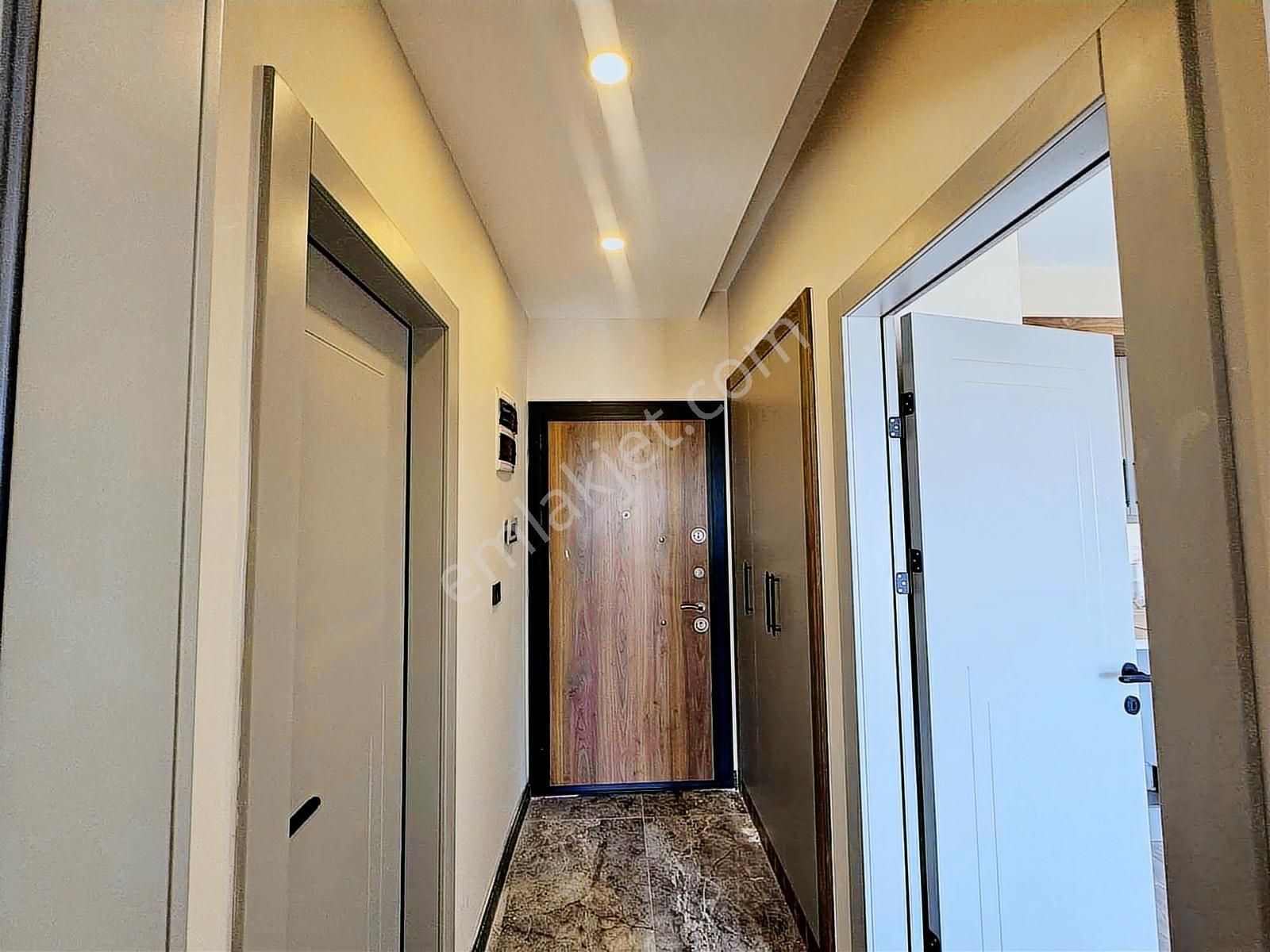 Kuşadası Davutlar'da Ara Kat Ebeveyn Banyolu Satılık 2+1 Daire - Görsel 22