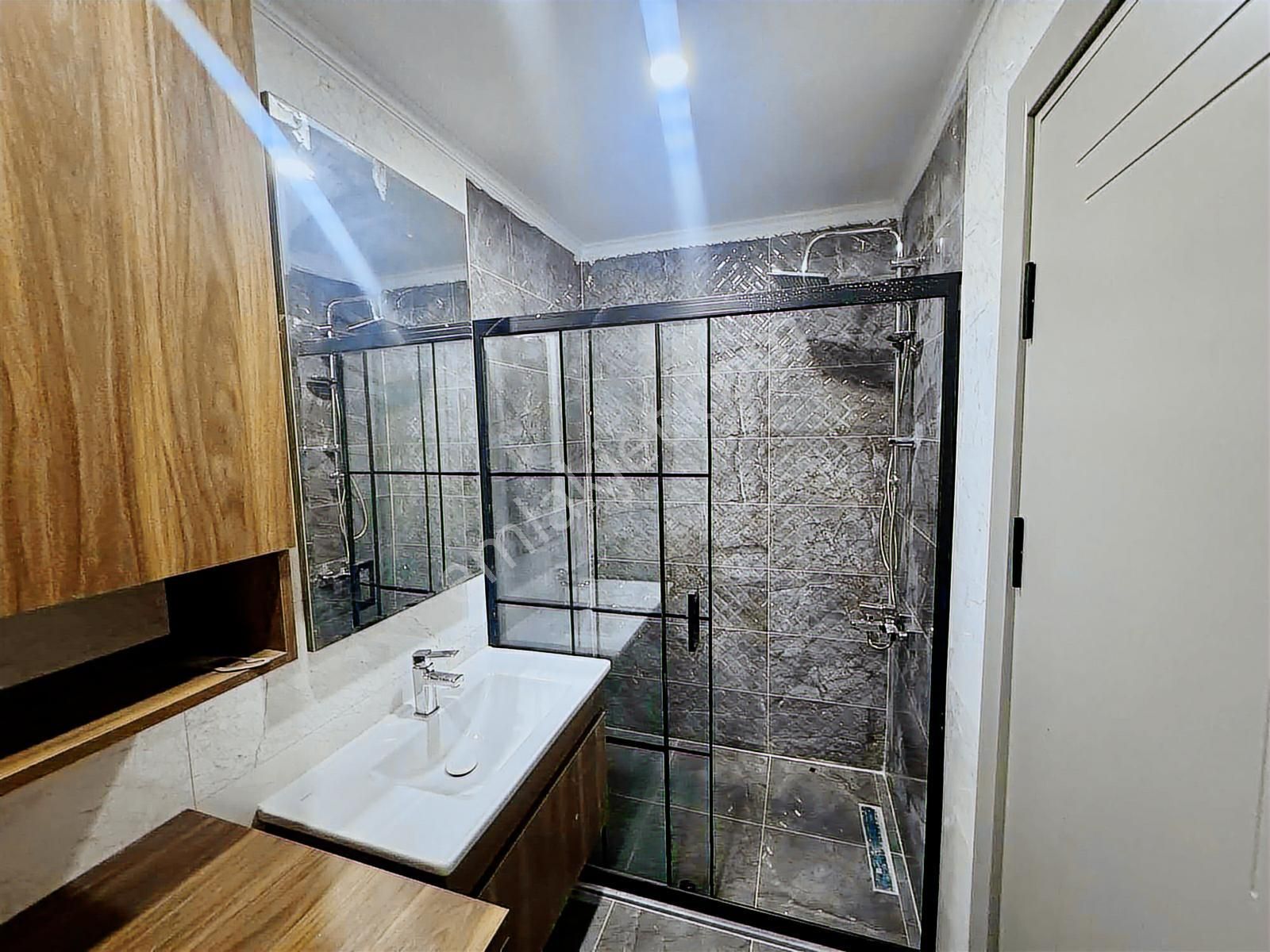 Kuşadası Davutlar'da Ara Kat Ebeveyn Banyolu Satılık 2+1 Daire - Görsel 13