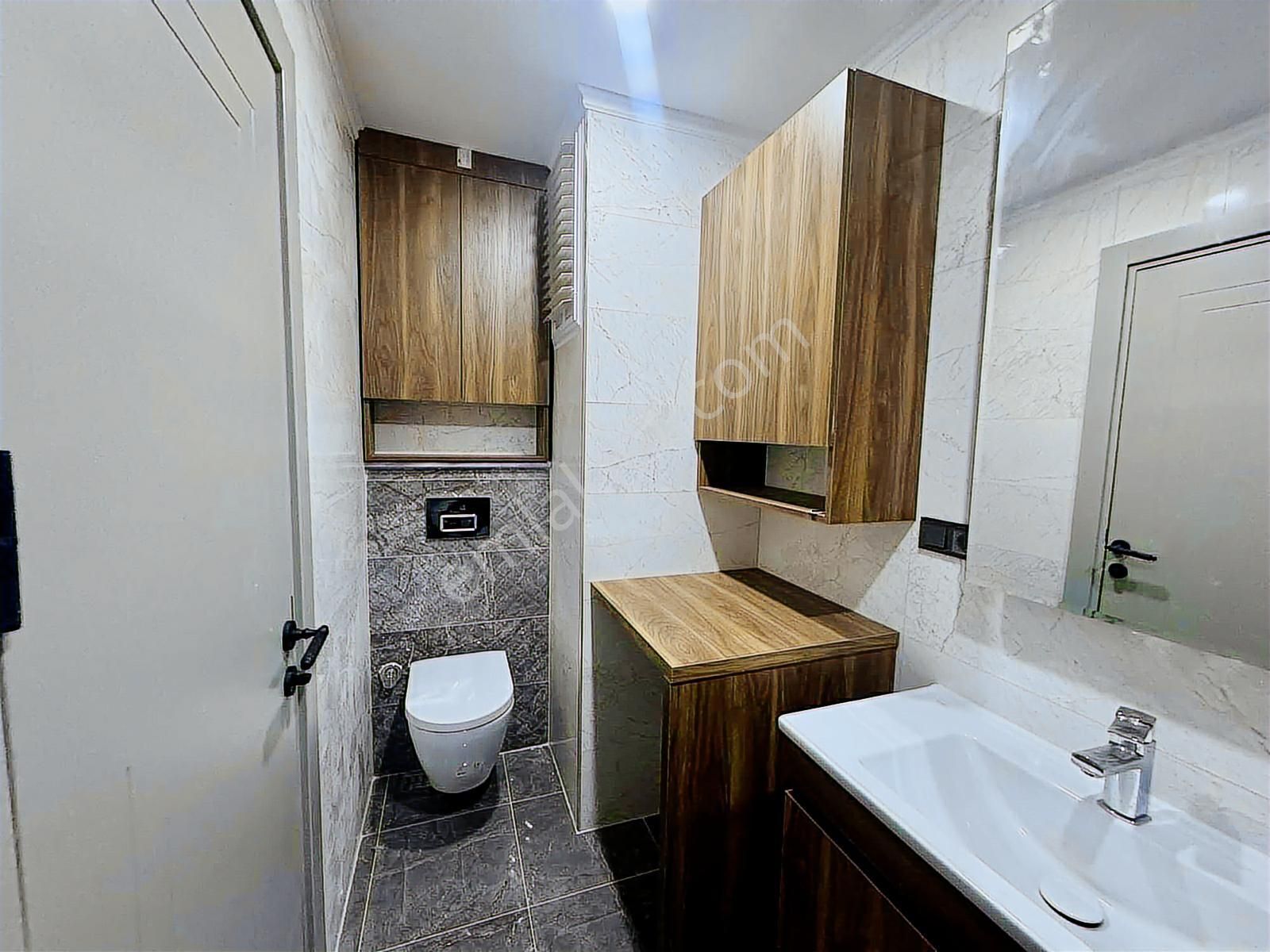 Kuşadası Davutlar'da Ara Kat Ebeveyn Banyolu Satılık 2+1 Daire - Görsel 14