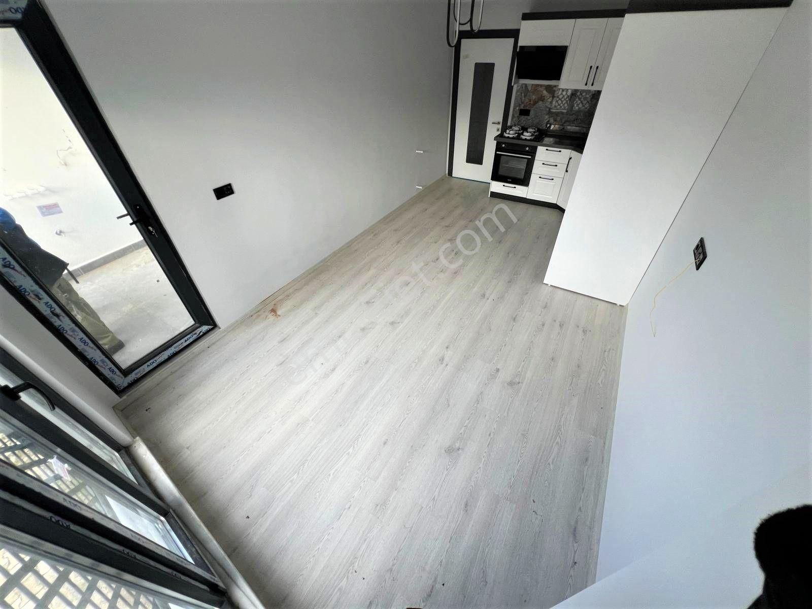 Alfa'dan Zeytinli'de Kiralık Doğayla İç İçe Huzuru Arayanlara Şık Tasarımlı 2+1 Daire - Görsel 35