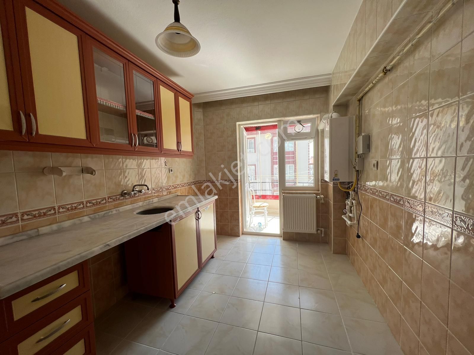 Kalecik Emlak'tan Merkezde G.cephe Orta Kat Masrafsız 3+1 Daire