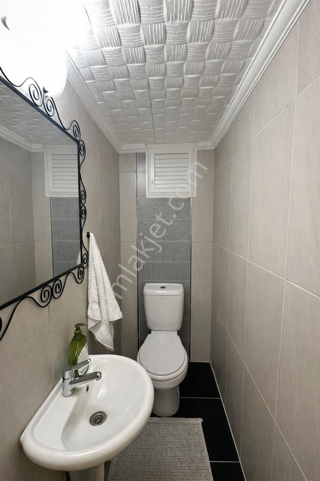 Karşıyaka, Bostanlı'da Müstakil Tadında 3+1 Satılık Daire - Görsel 12