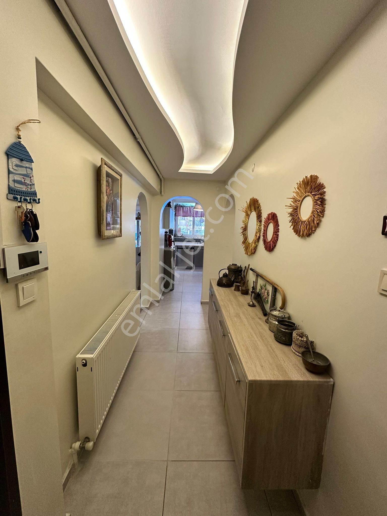 Karşıyaka, Bostanlı'da Müstakil Tadında 3+1 Satılık Daire - Görsel 20