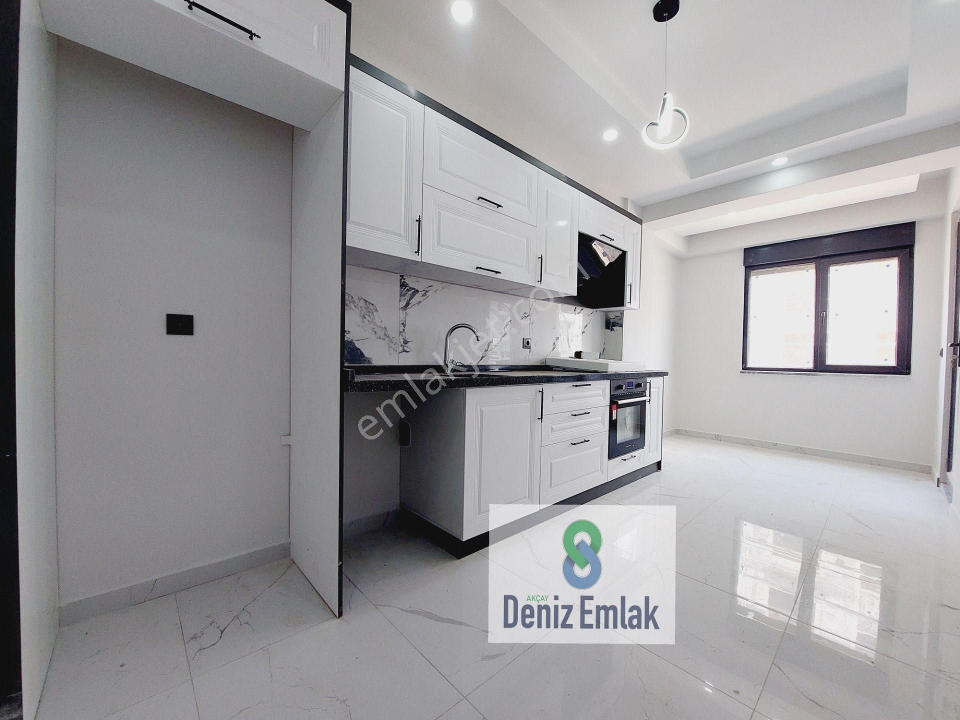Denizden Akçayda Öncephe Ebeveynli Otoparklı Yerden Isıtmalı Satılık 2+1daire.
