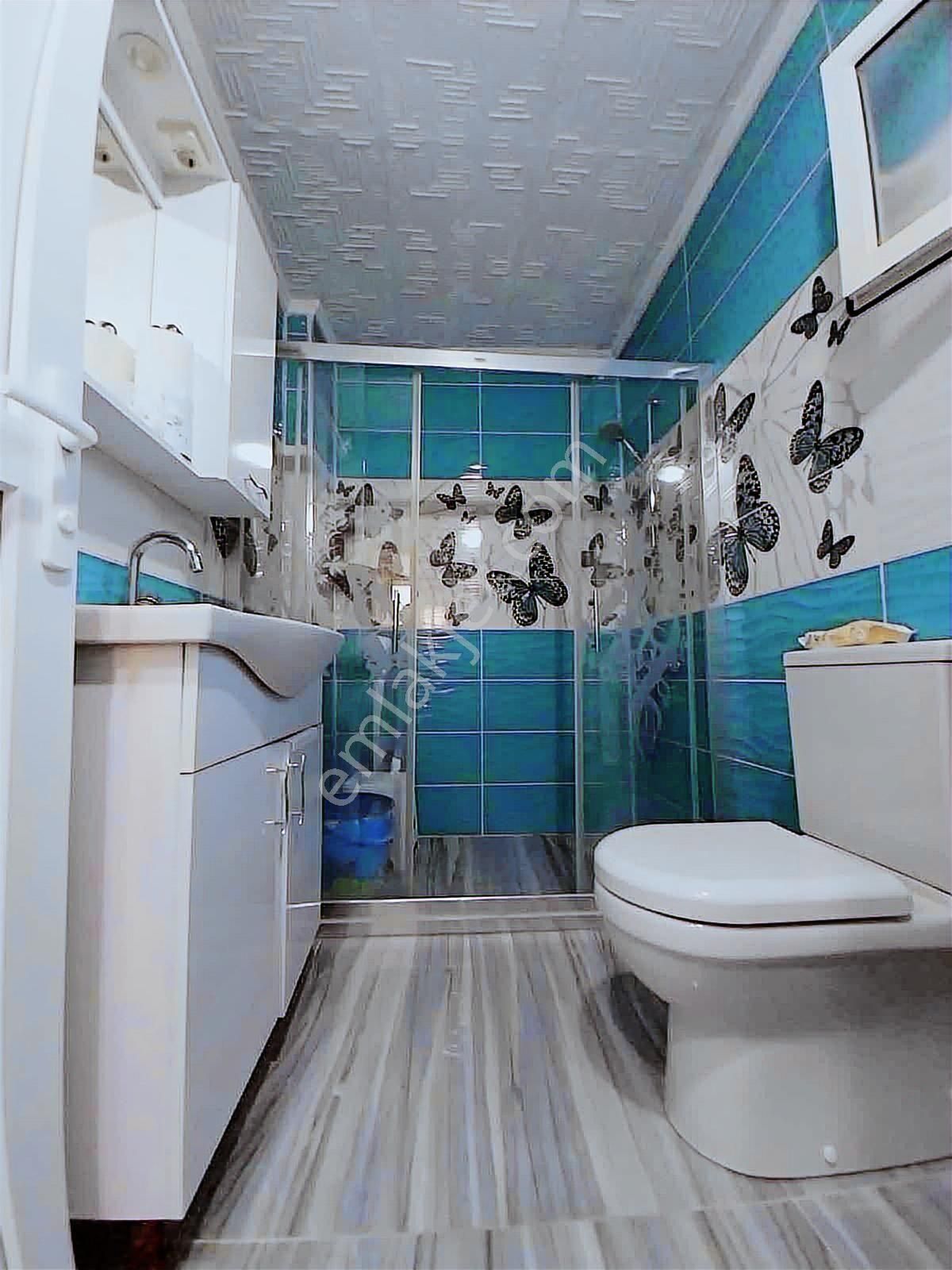 Kuşadası Özboğaziçi Sitesinde 4+1 Tripleks Deniz Manzaralı