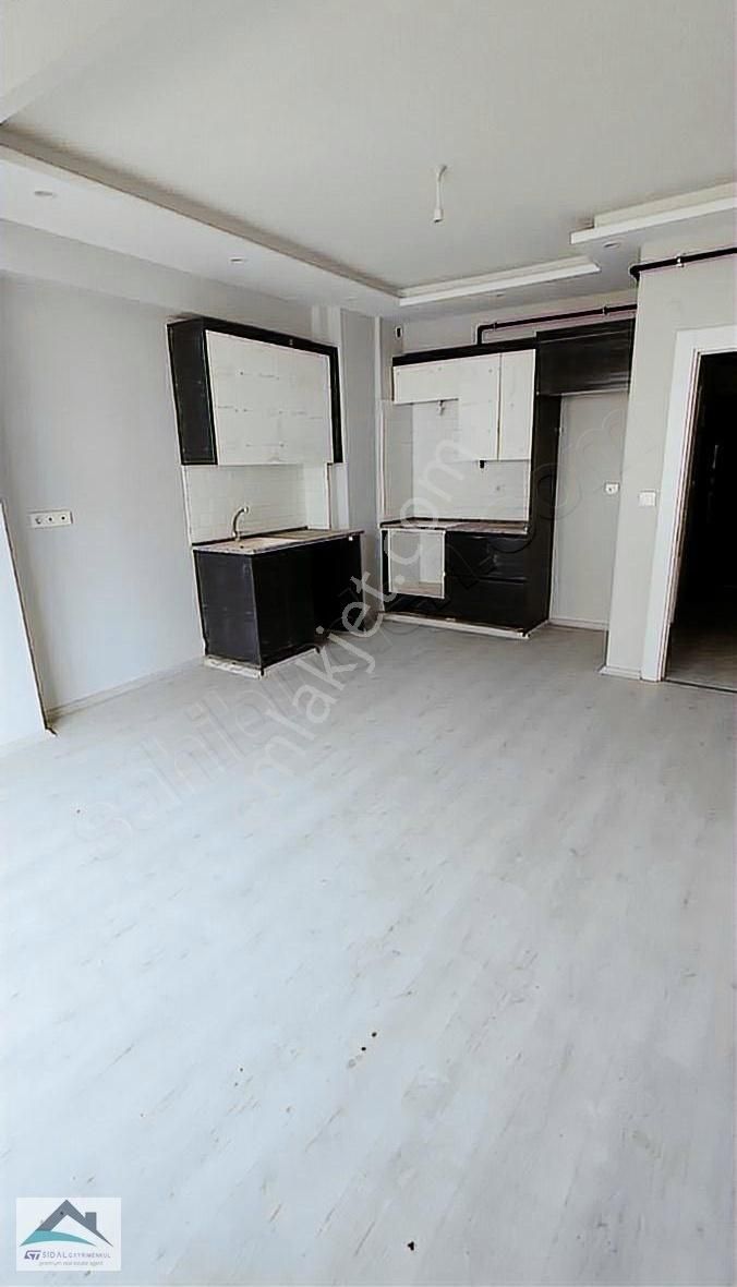 50.yıl Mahallesinde Caddeye Yakın Konumda Satılık Ara Kat Daire - Görsel 2