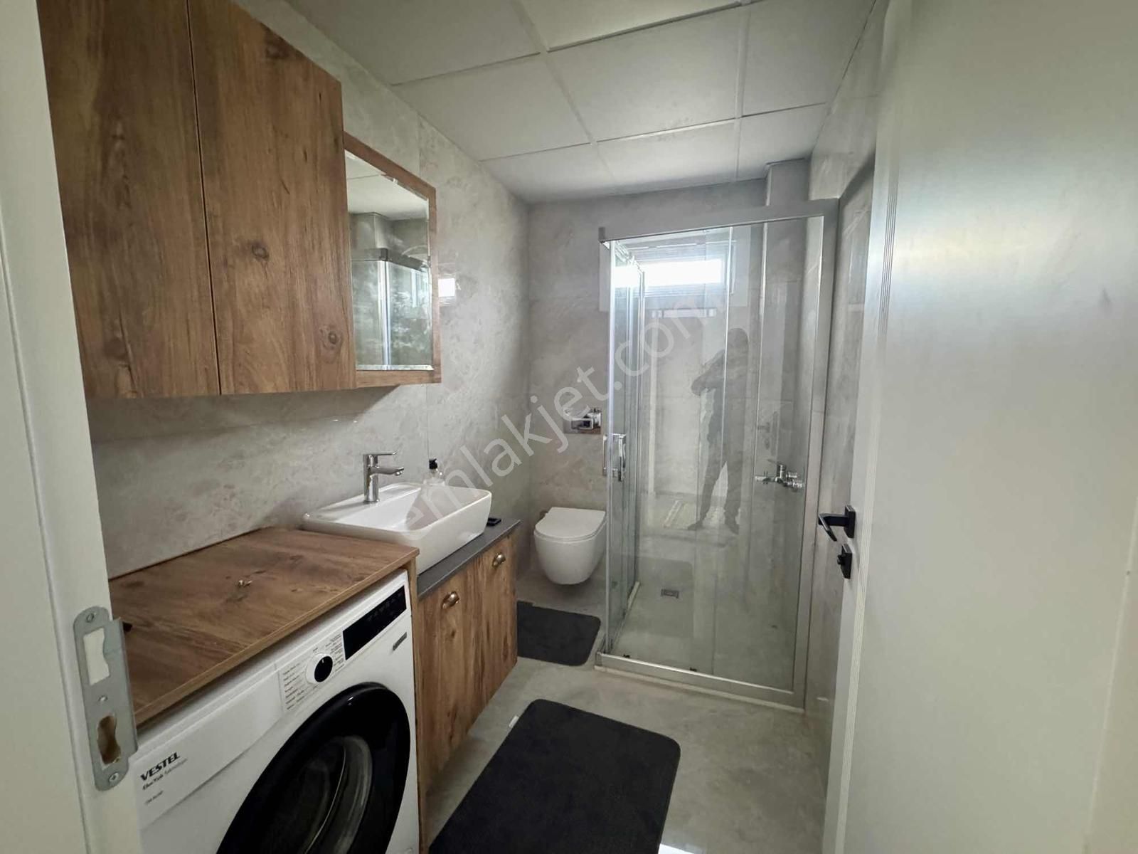 Kuşadası'nda Havuzlu Full Sıfır Eşyalı Satılık 1+1 Bahçeli Daire - Görsel 5