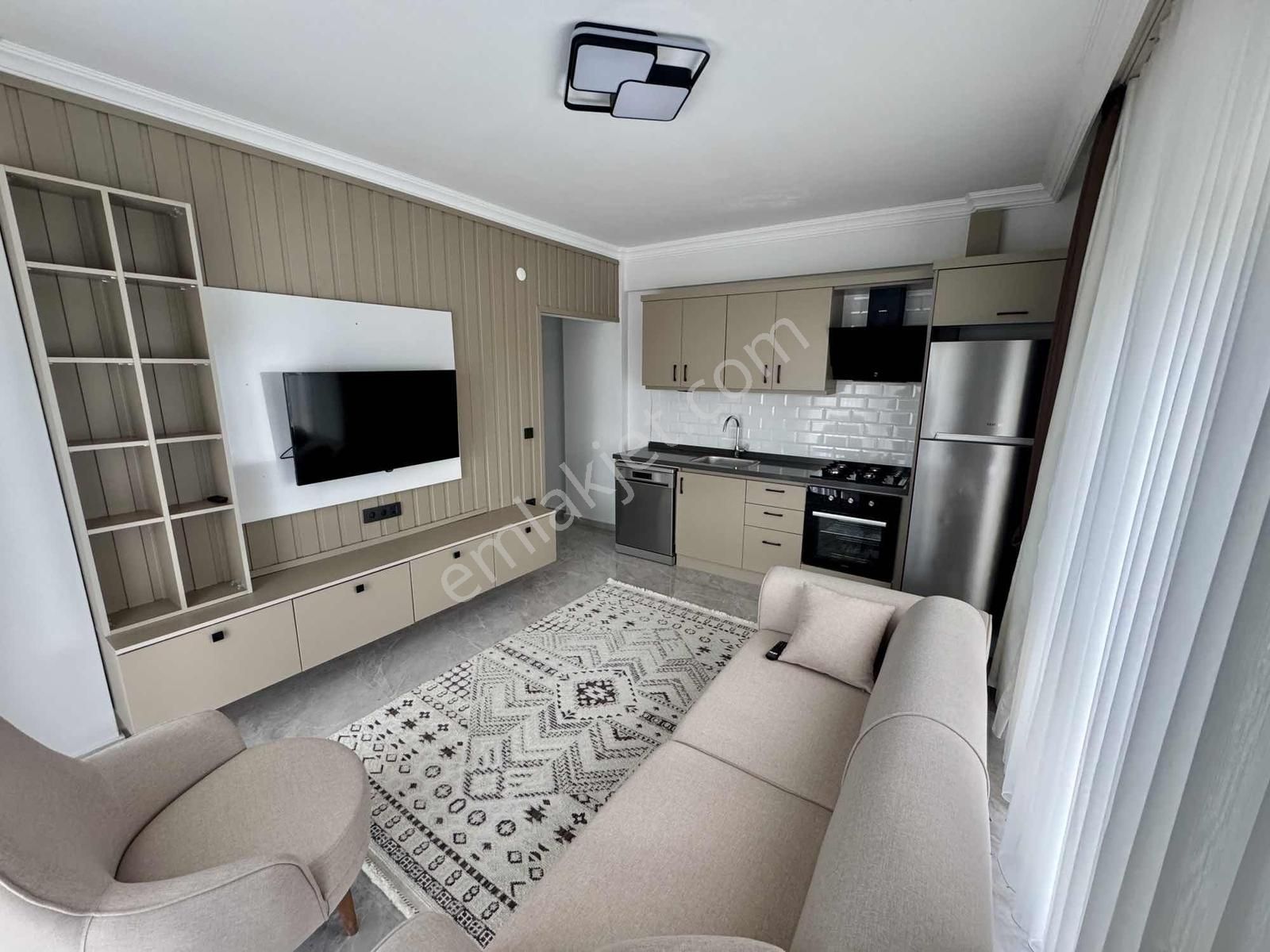 Kuşadası'nda Havuzlu Full Sıfır Eşyalı Satılık 1+1 Bahçeli Daire - Görsel 16