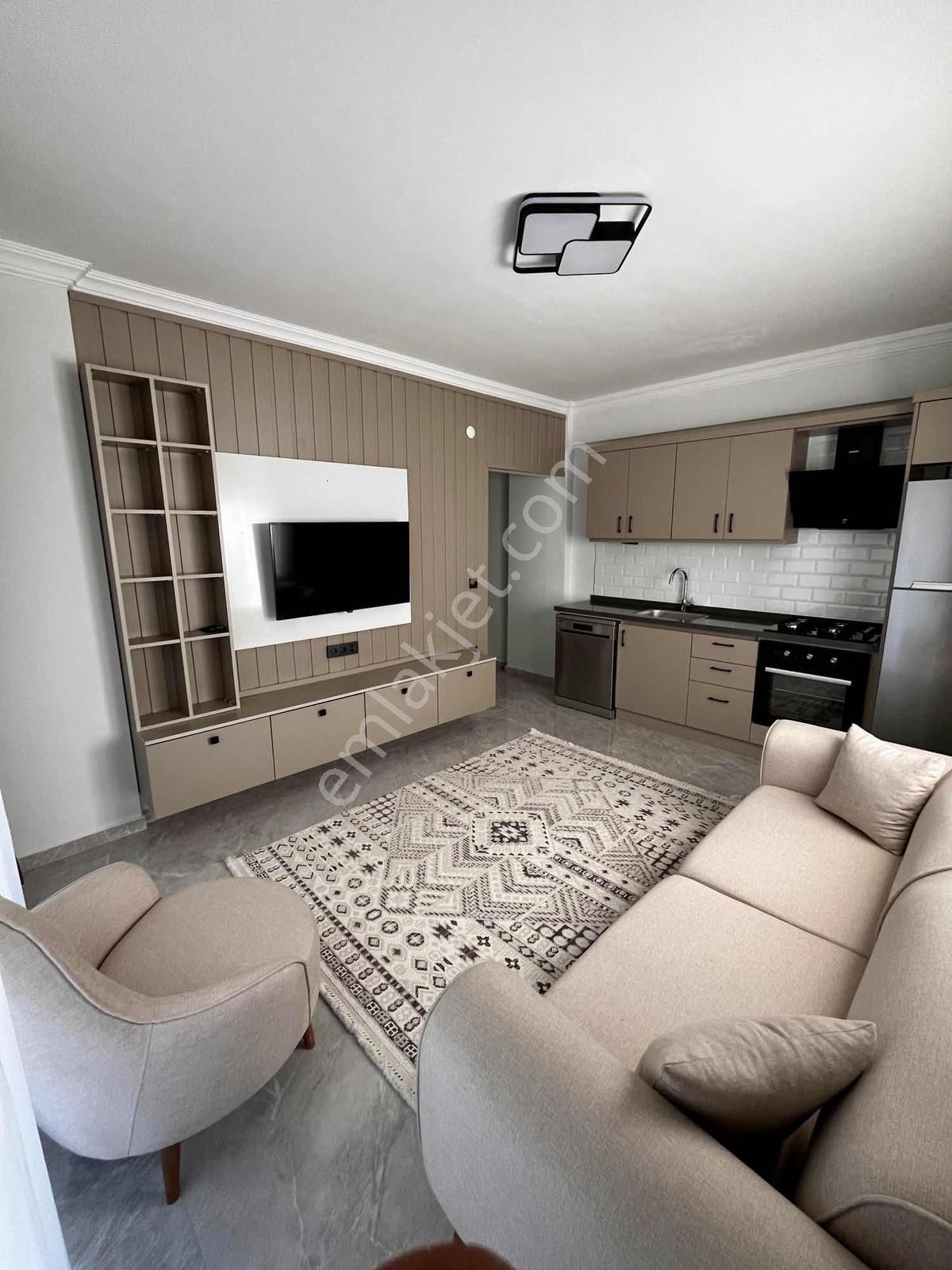 Kuşadası'nda Havuzlu Full Sıfır Eşyalı Satılık 1+1 Bahçeli Daire - Görsel 12