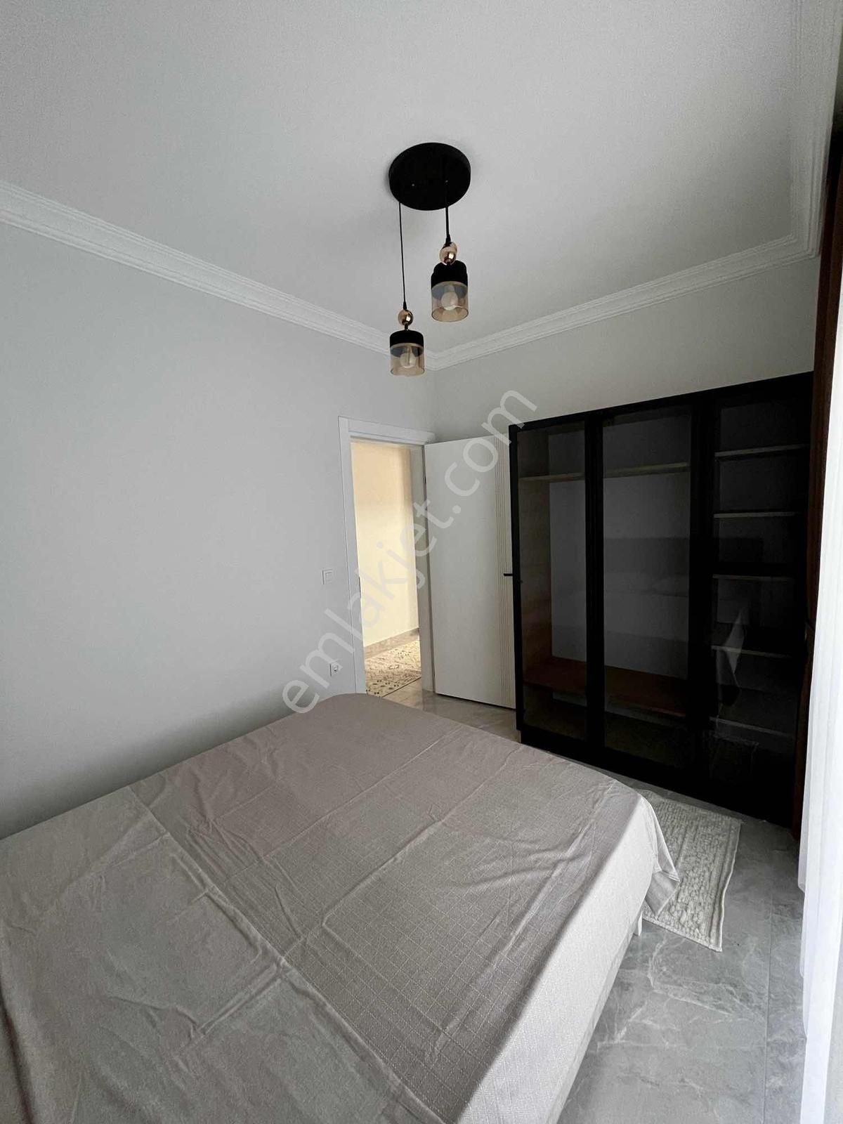 Kuşadası'nda Havuzlu Full Sıfır Eşyalı Satılık 1+1 Bahçeli Daire - Görsel 4