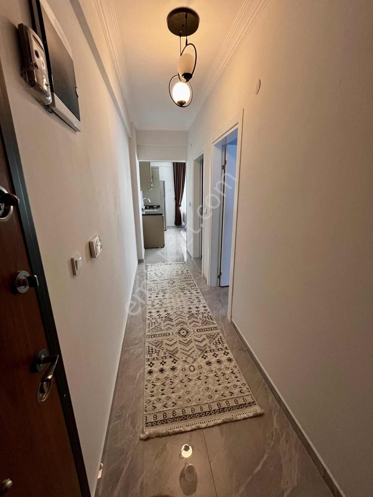 Kuşadası'nda Havuzlu Full Sıfır Eşyalı Satılık 1+1 Bahçeli Daire - Görsel 9