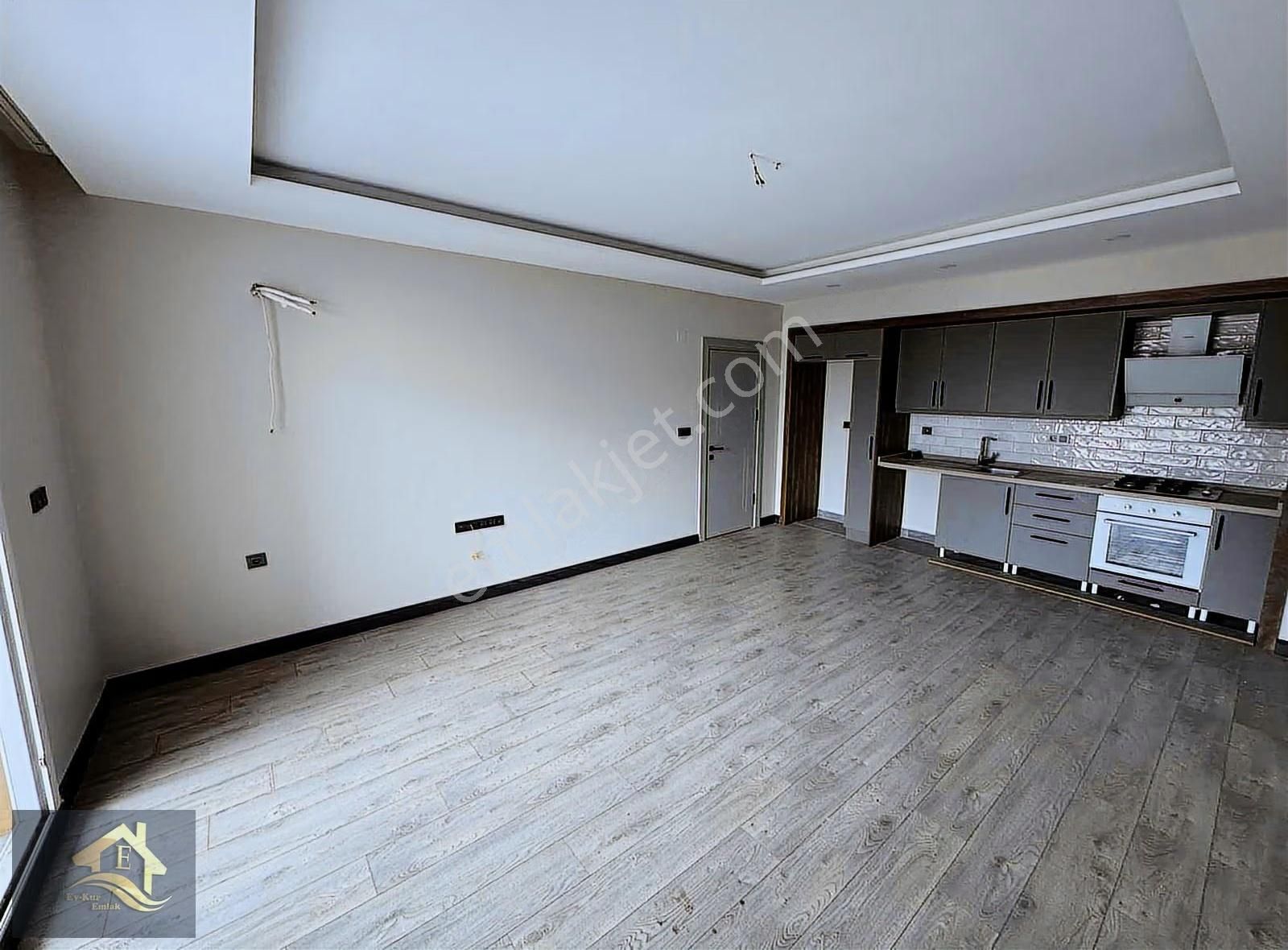 Kuşadası Davutlar'da Ara Kat Ebeveyn Banyolu Satılık 2+1 Daire - Görsel 17