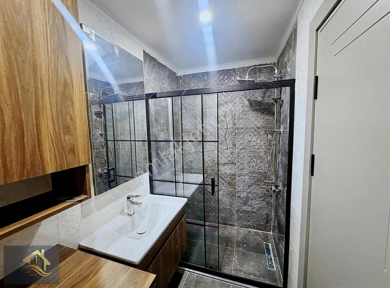 Kuşadası Davutlar'da Ara Kat Ebeveyn Banyolu Satılık 2+1 Daire - Görsel 11