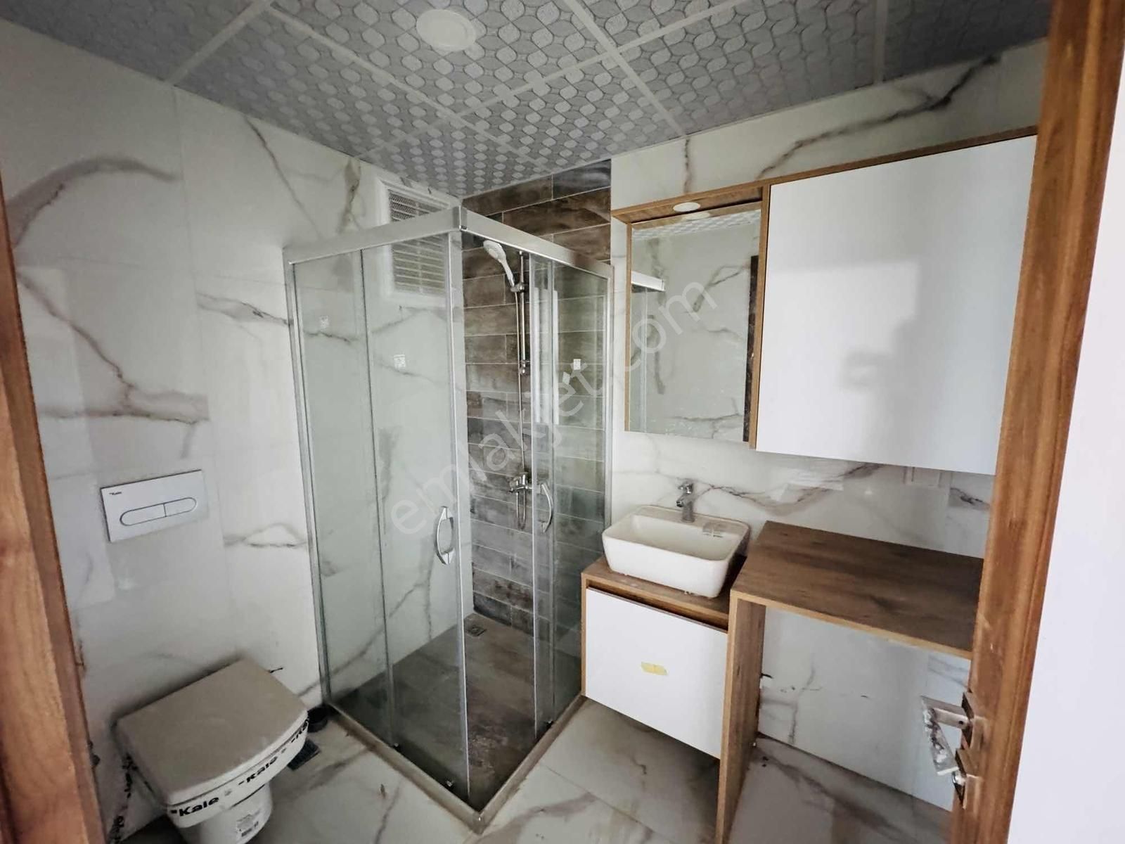 Kuşadası Davutlar'da Havuzlu Otoparklı Sitede 3+1 Dubleks Daire - Görsel 24