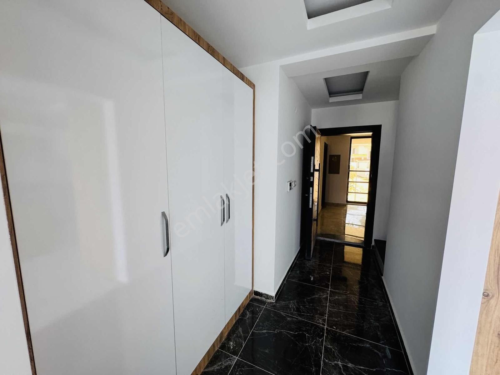 Kuşadası Davutlar'da Havuzlu Otoparklı Sitede 3+1 Dubleks Daire - Görsel 12