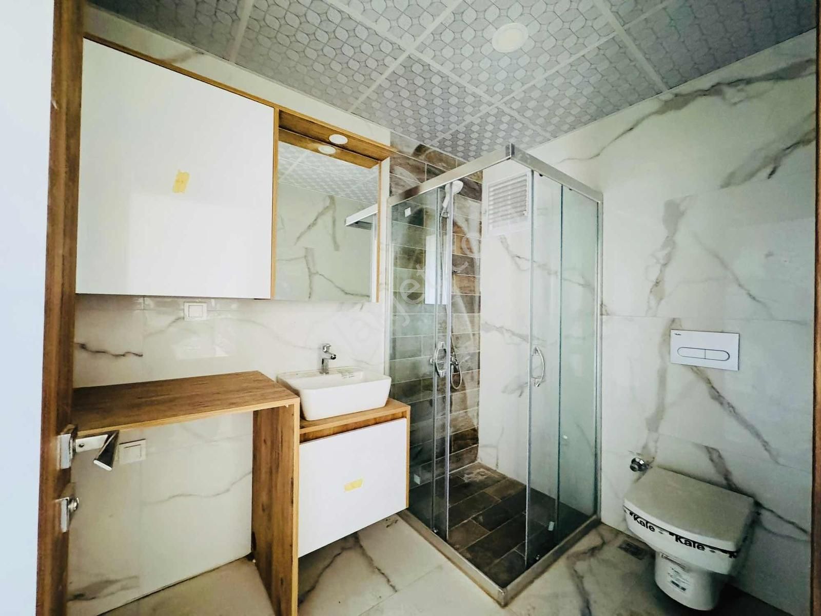 Kuşadası Davutlar'da Havuzlu Otoparklı Sitede 3+1 Dubleks Daire - Görsel 33