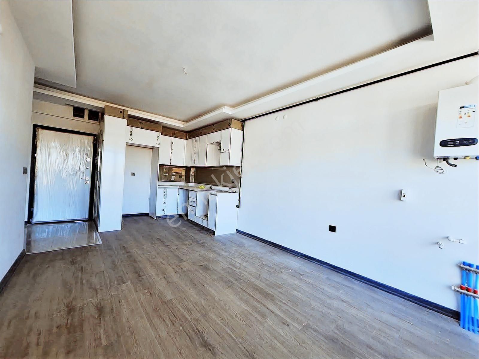 İncek Emlak'tan Geniş M2 Masrafsız İskanlı 1+1 Satılık Daire - Görsel 19