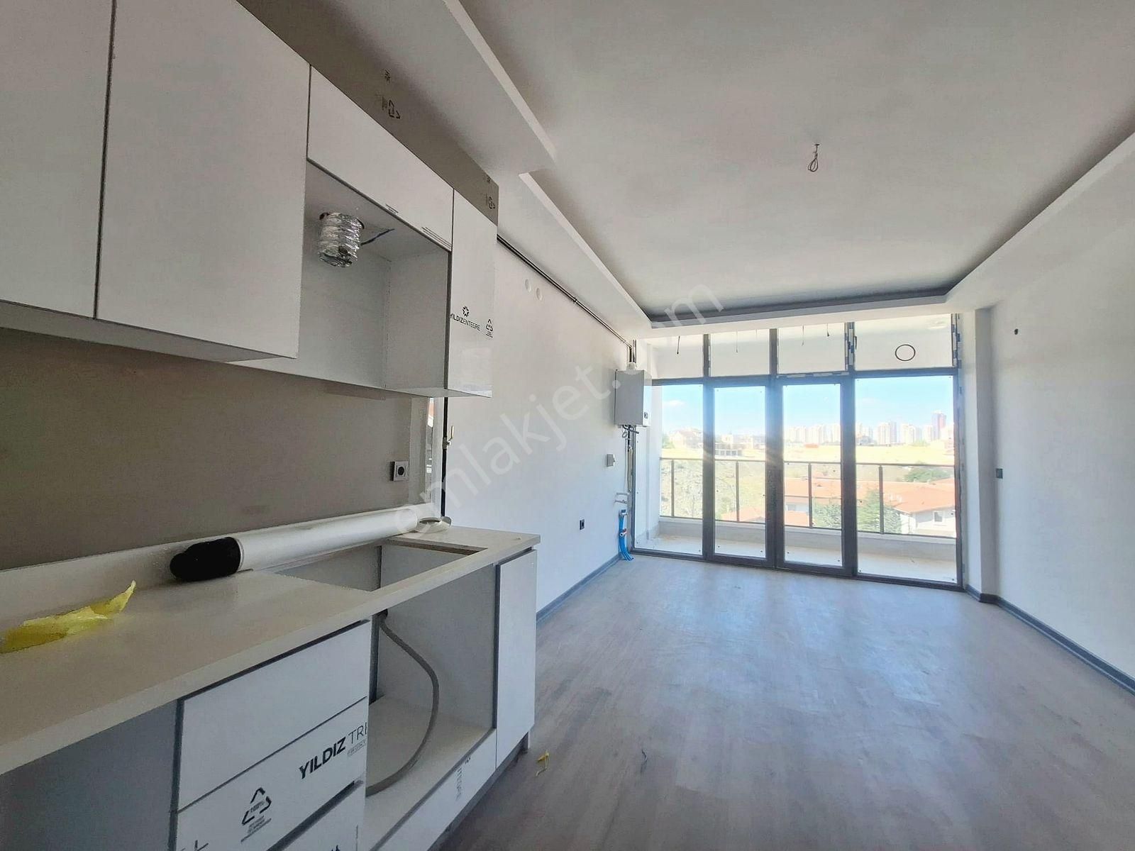 İncek Emlak'tan Geniş M2 Masrafsız İskanlı 1+1 Satılık Daire - Görsel 38