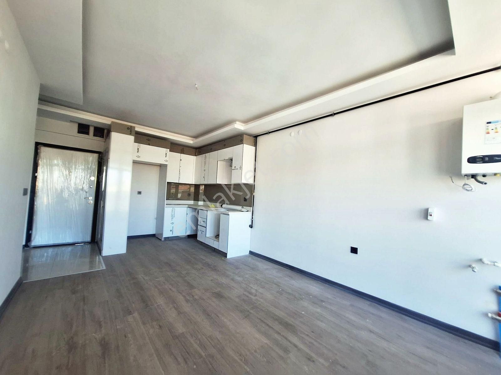 İncek Emlak'tan Geniş M2 Masrafsız İskanlı 1+1 Satılık Daire - Görsel 11