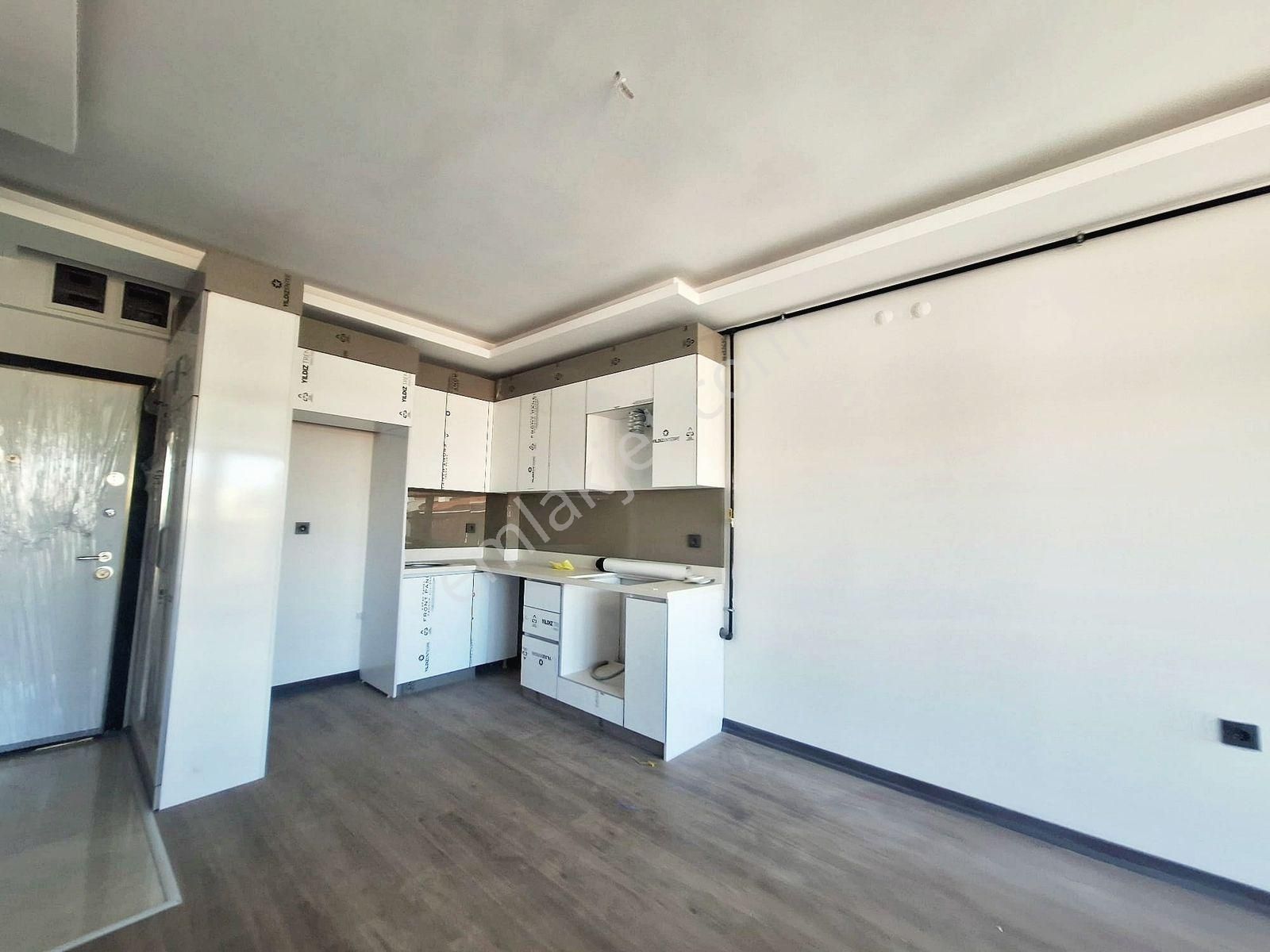 İncek Emlak'tan Geniş M2 Masrafsız İskanlı 1+1 Satılık Daire - Görsel 30