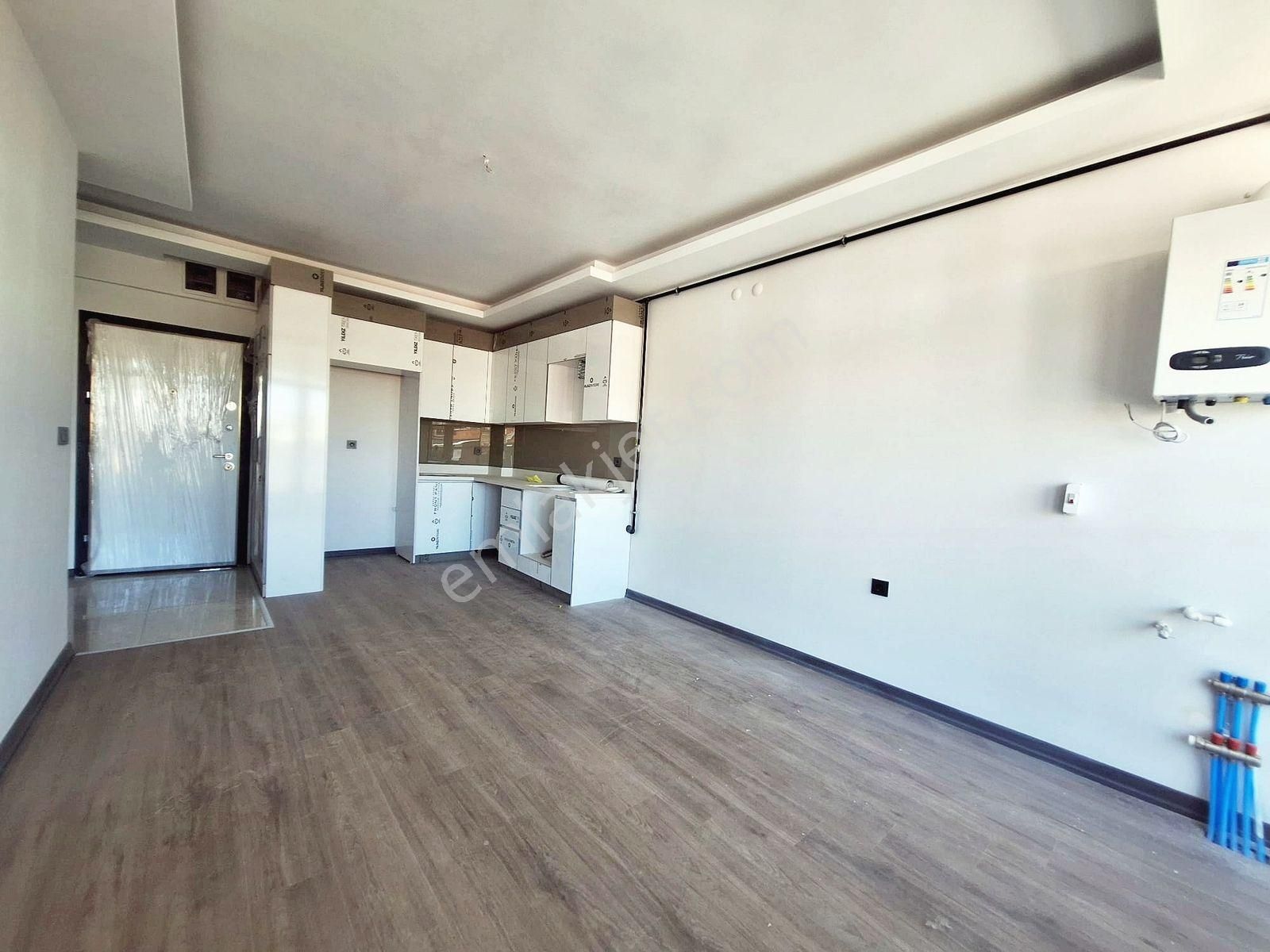 İncek Emlak'tan Geniş M2 Masrafsız İskanlı 1+1 Satılık Daire - Görsel 45