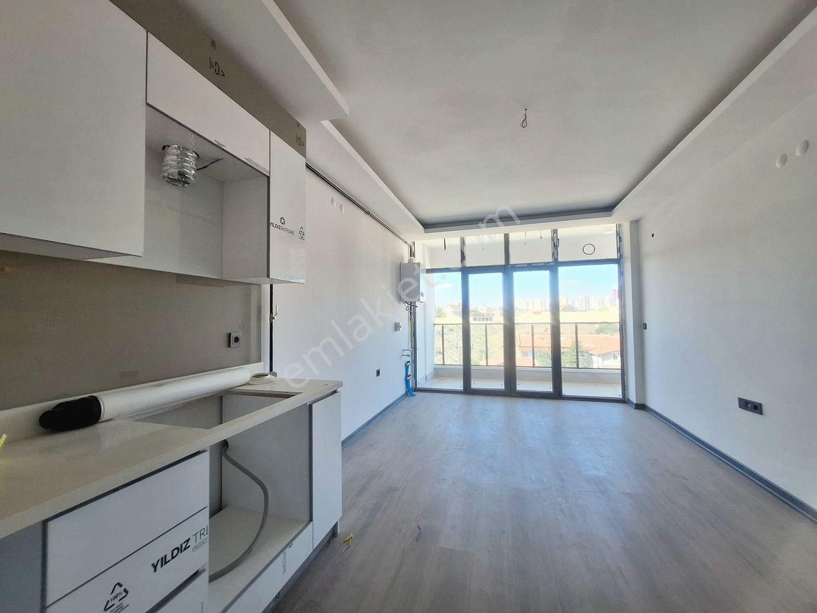 İncek Emlak'tan Geniş M2 Masrafsız İskanlı 1+1 Satılık Daire - Görsel 44
