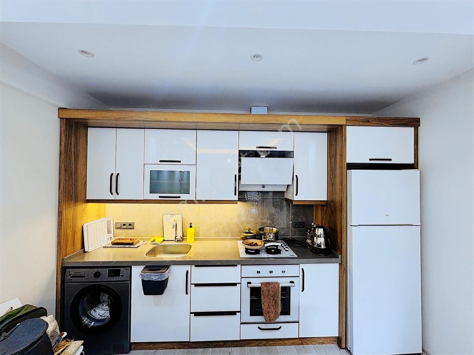 Kuşadası Davutlar'da Kendine Ait Bahçeli Satılık 1+1 Daire - Görsel 3