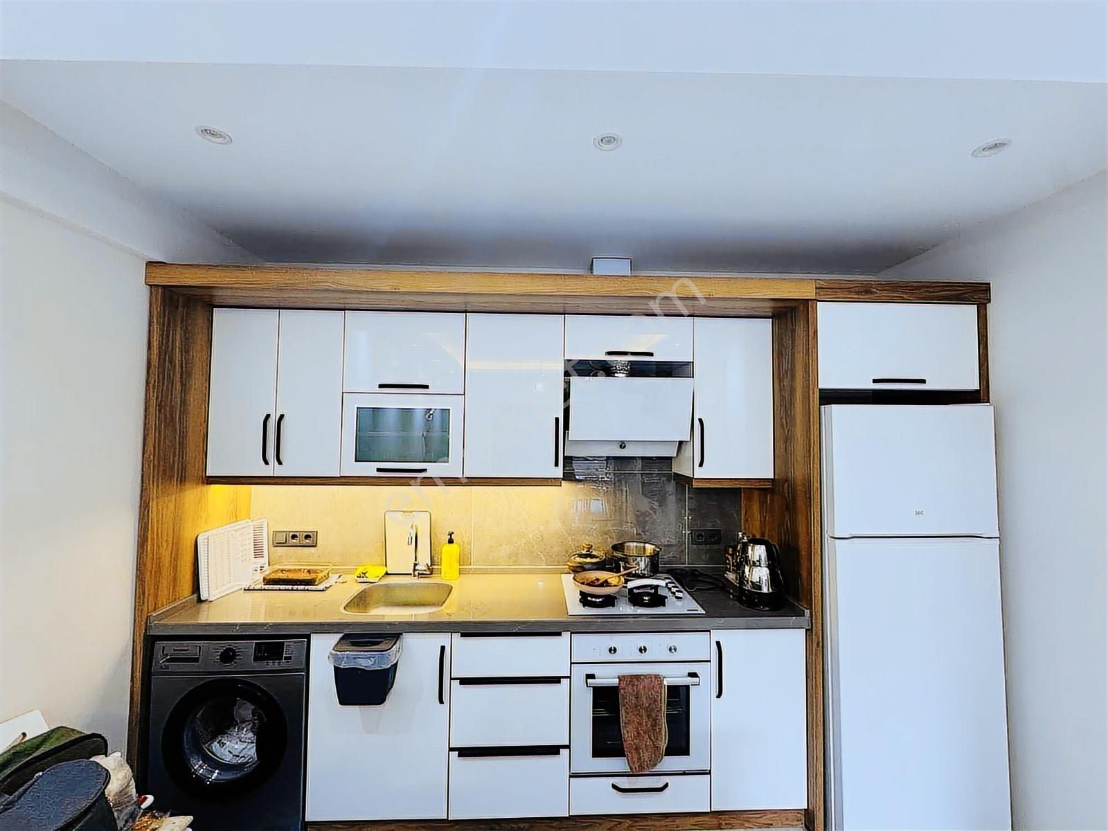 Kuşadası Davutlar'da Kendine Ait Bahçeli Satılık 1+1 Daire - Görsel 9