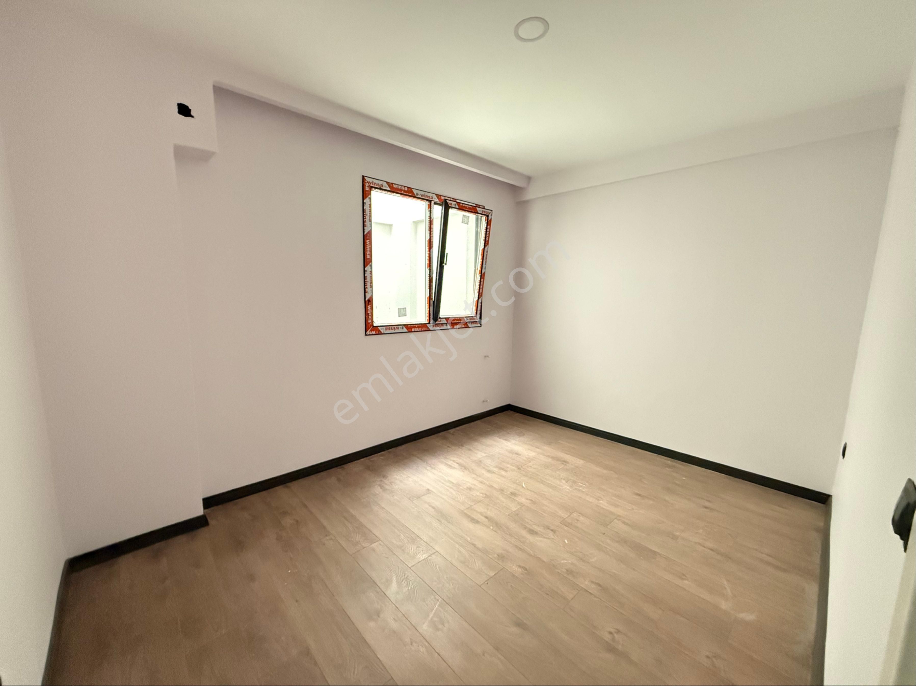 Kuşadası Davutlar Merkezde Satılık 2+1 Geniş Daire - Görsel 11