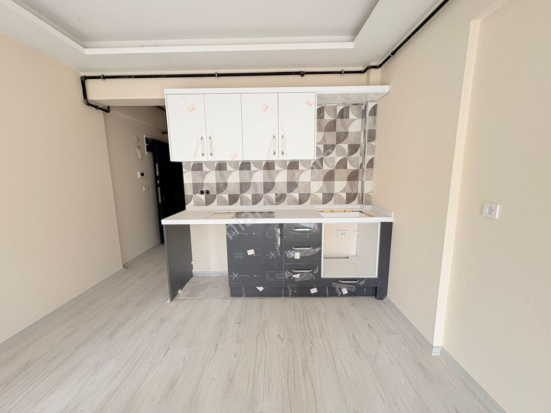 Seyrek Merkezi Konumda Bahçeli Satılık 1+1 Daire - Görsel 2