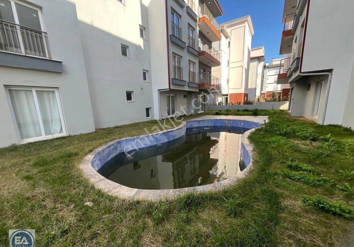 Kuşadası Davutlar’da Havuzlu Sitede Satılık 2 + 1 Daire - Görsel 2