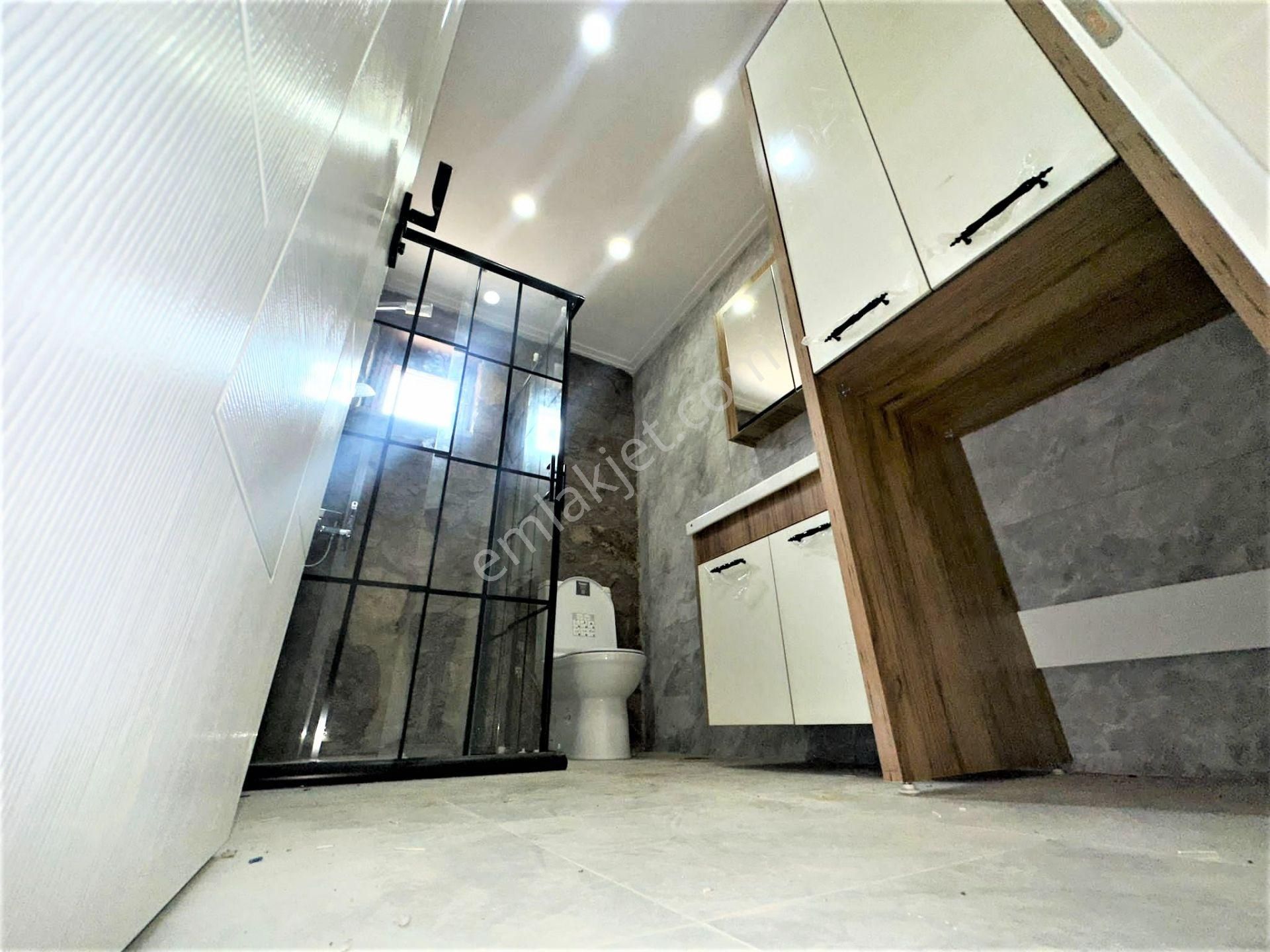 Aygül'den Edremit Çamcı'da Sıfır Amerikan Mutfaklı Giyinme Odalı Şömineli Bahçeli 3+1 Satılık Taş Ev - Görsel 26