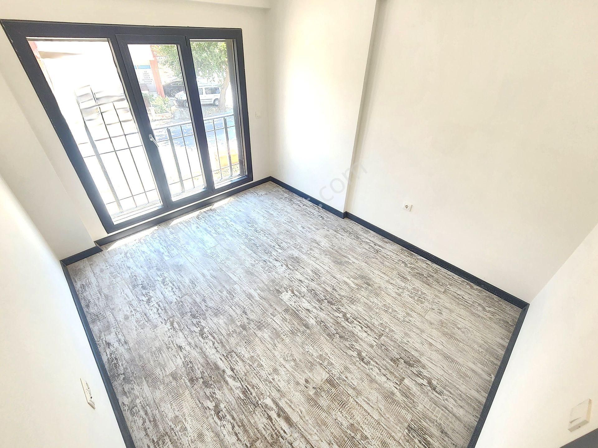 Burhaniye'de Aygül'den Kaçırılmayacak Sıfır Kat Cephe Seçenekleriyle Çift Balkonlu 1+1 Satılık Daire - Görsel 21