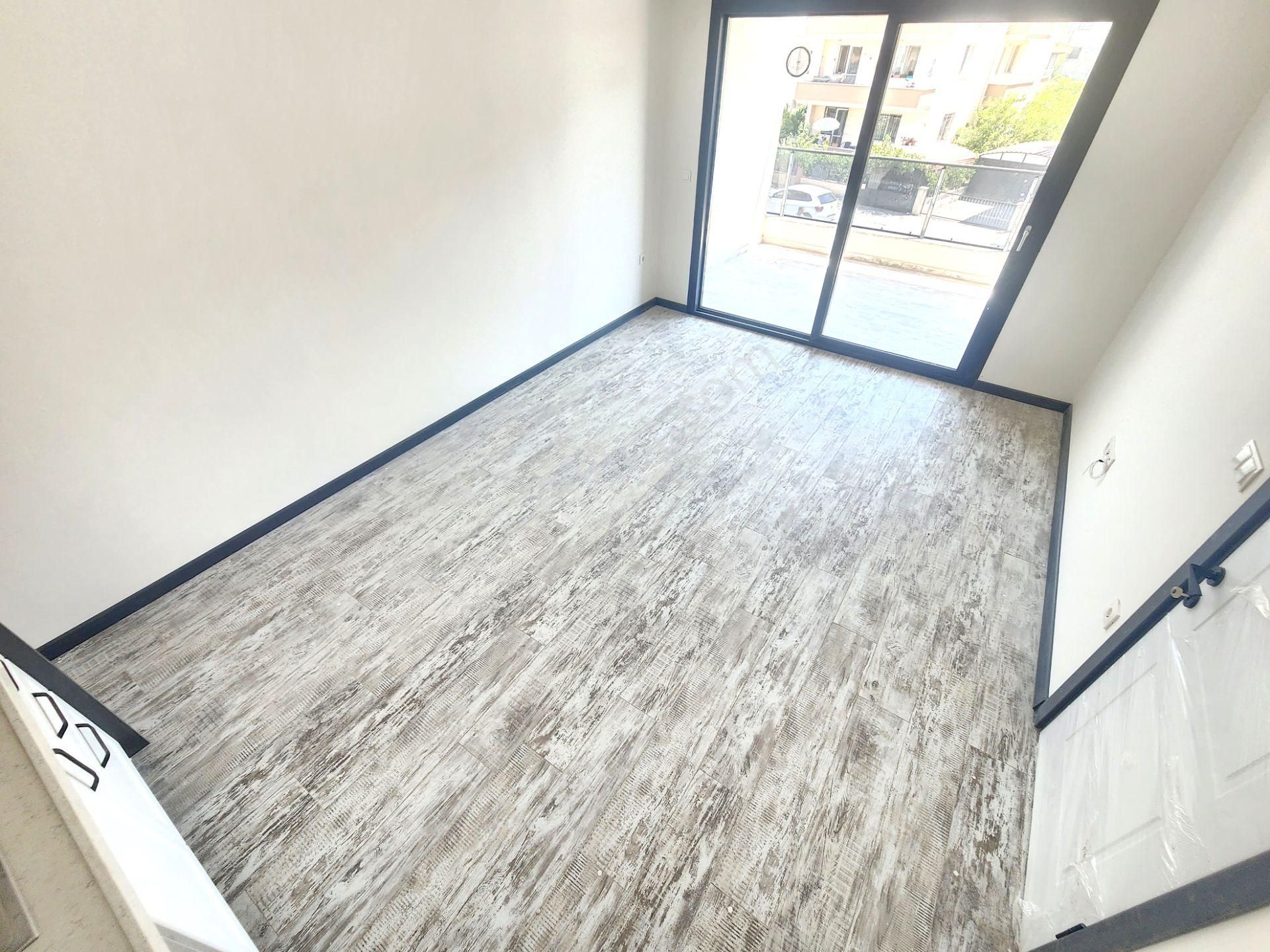 Burhaniye'de Aygül'den Kaçırılmayacak Sıfır Kat Cephe Seçenekleriyle Çift Balkonlu 1+1 Satılık Daire - Görsel 5