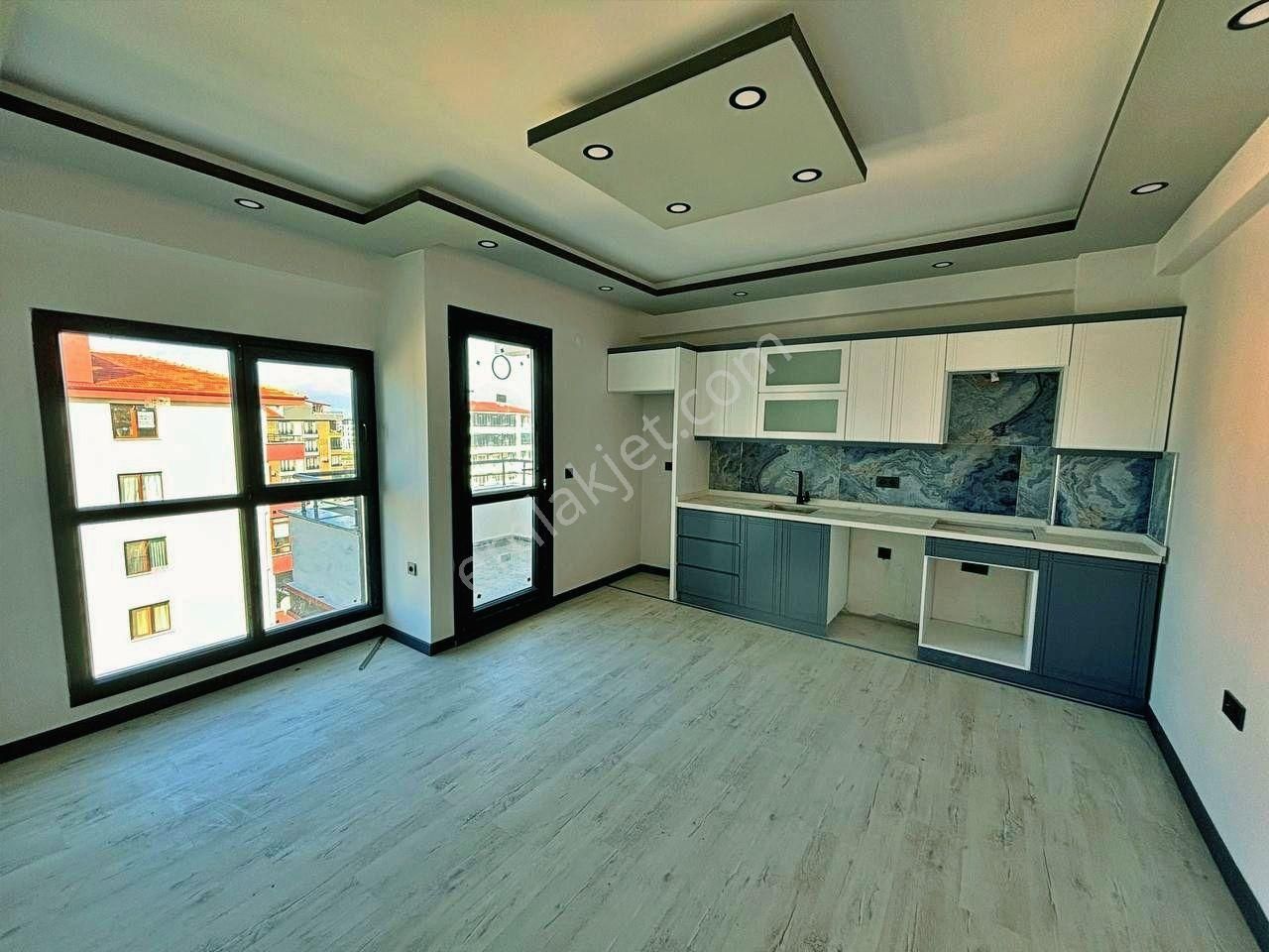 Uytundan Burhaniye Badem Alanında Doğal Gazlı Satılık 1+1 Daire
