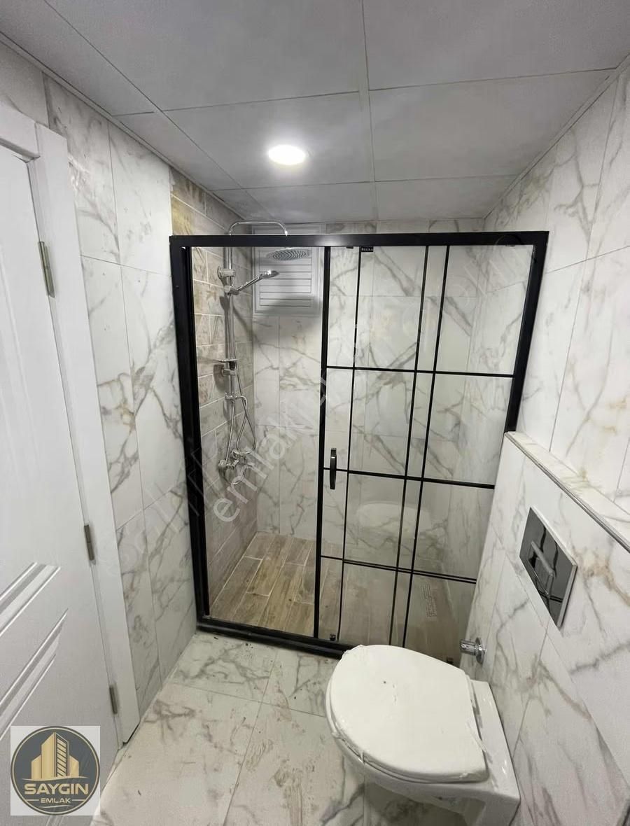 Atatürk Mahallesinde Satılık Havuzlu 1+1 Geniş Bahçe Katı Daire - Görsel 11