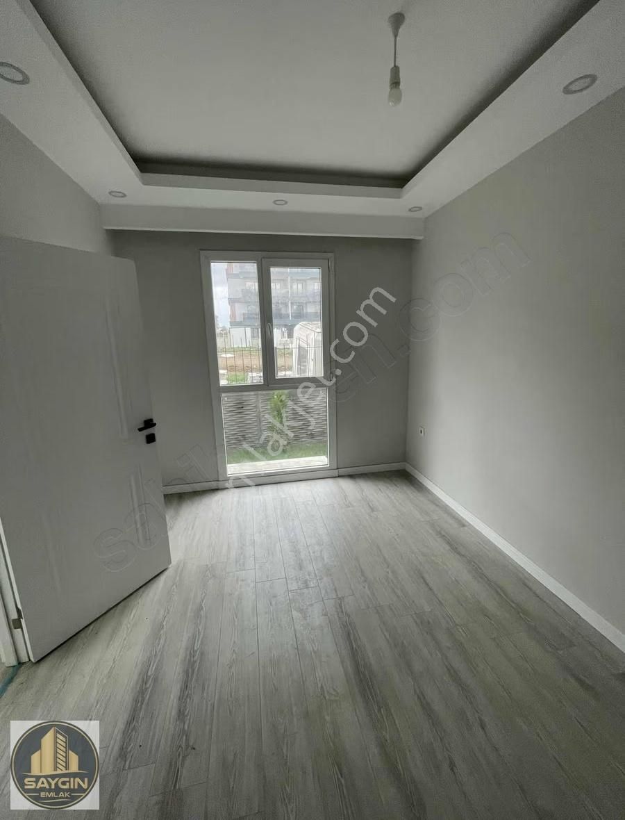 Atatürk Mahallesinde Satılık Havuzlu 1+1 Geniş Bahçe Katı Daire - Görsel 5