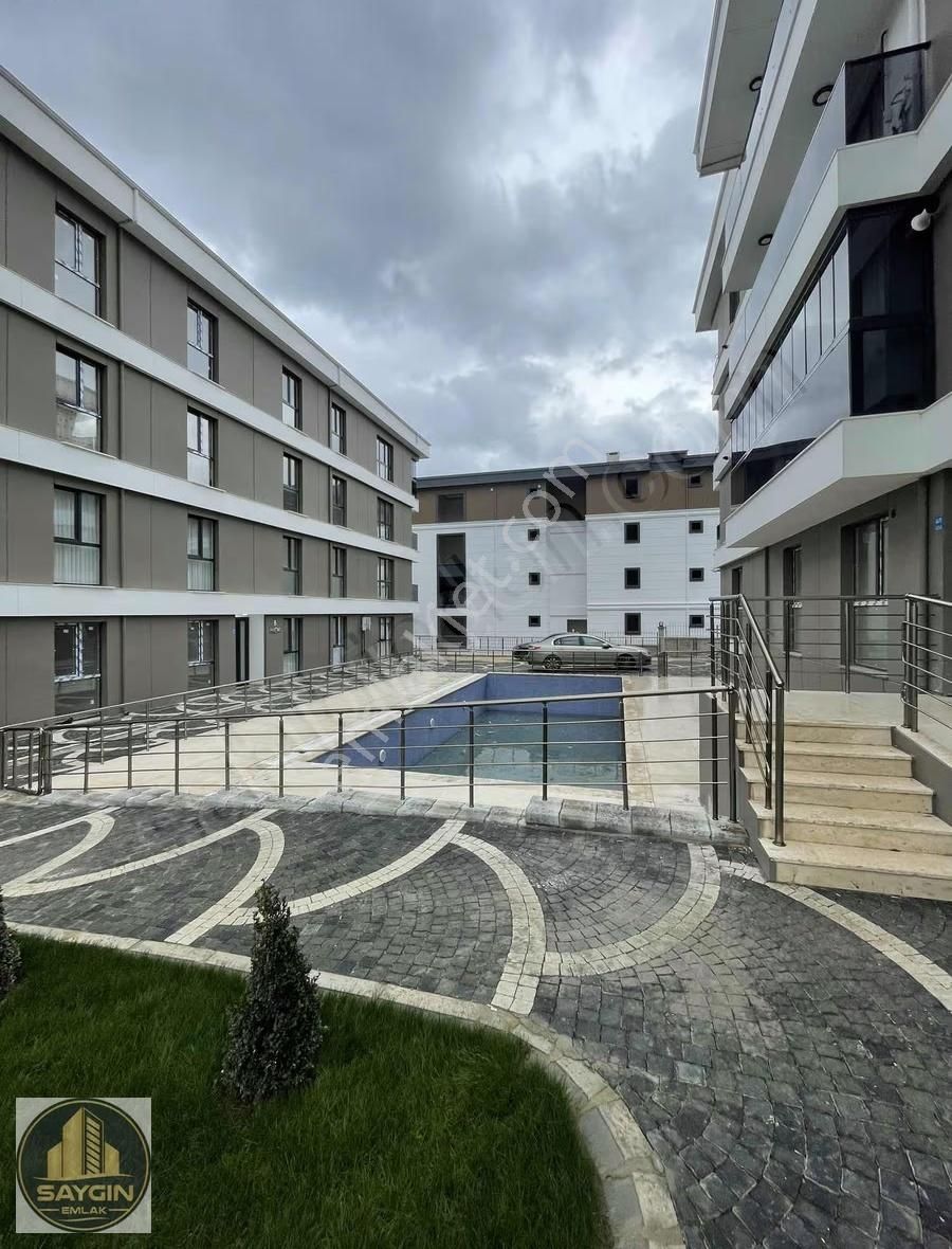 Atatürk Mahallesi'nde Havuzlu Ara Kat Geniş 1 + 1 Daire - Görsel 8