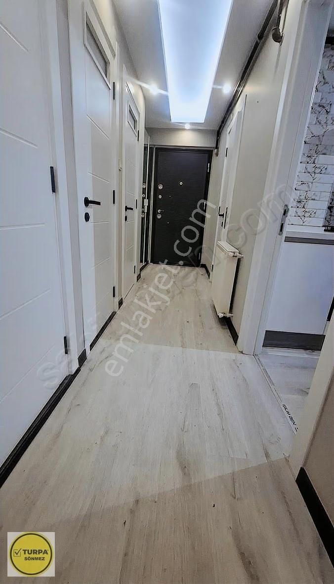 Turpa Sönmezden Buca Çamlıkulede Satılık Geniş Daire